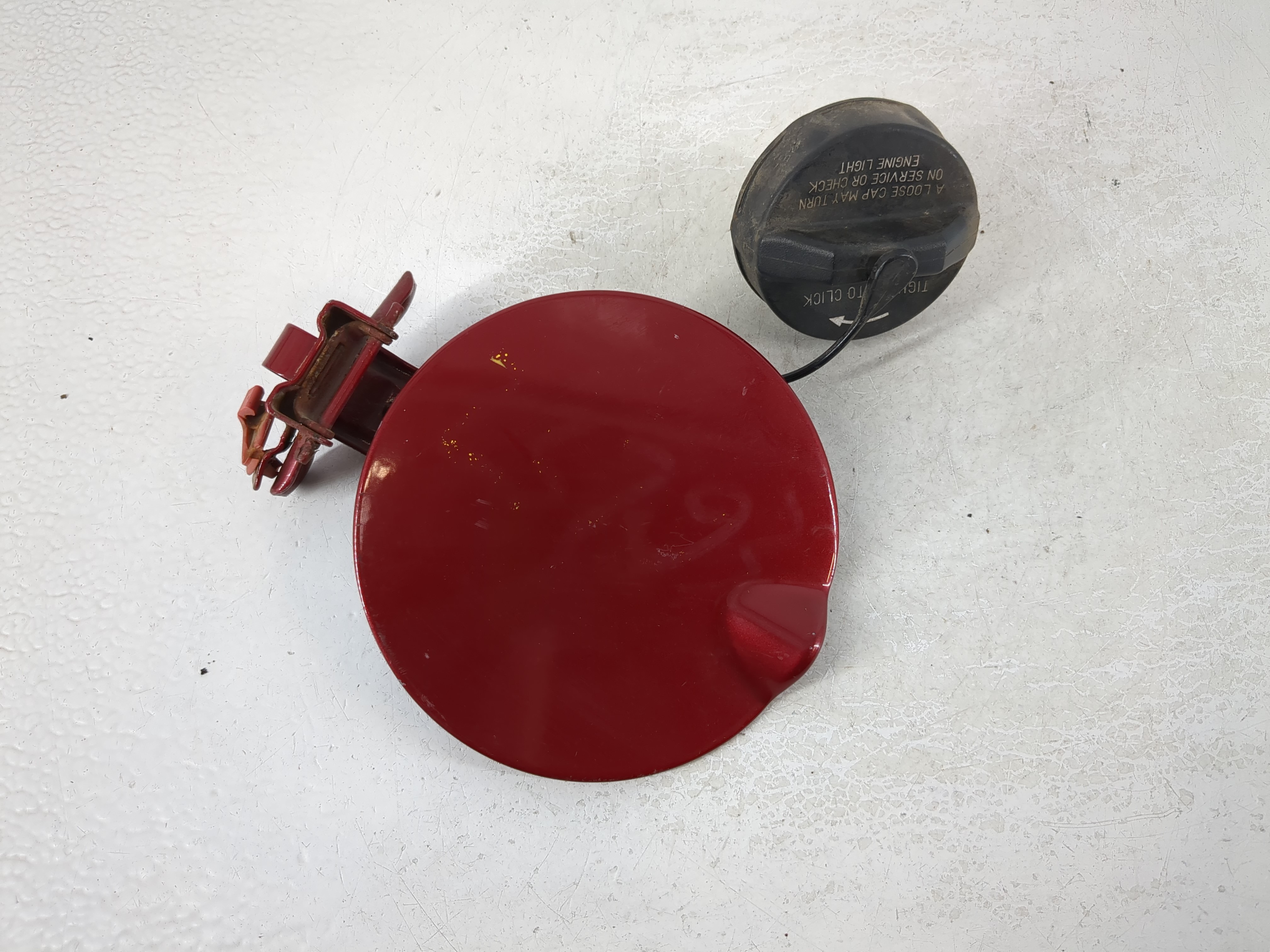 2009 Volkswagen Routan Fuel Tank Door Lid Gas Tank Red 1064077 - Oemusedautoparts1.com