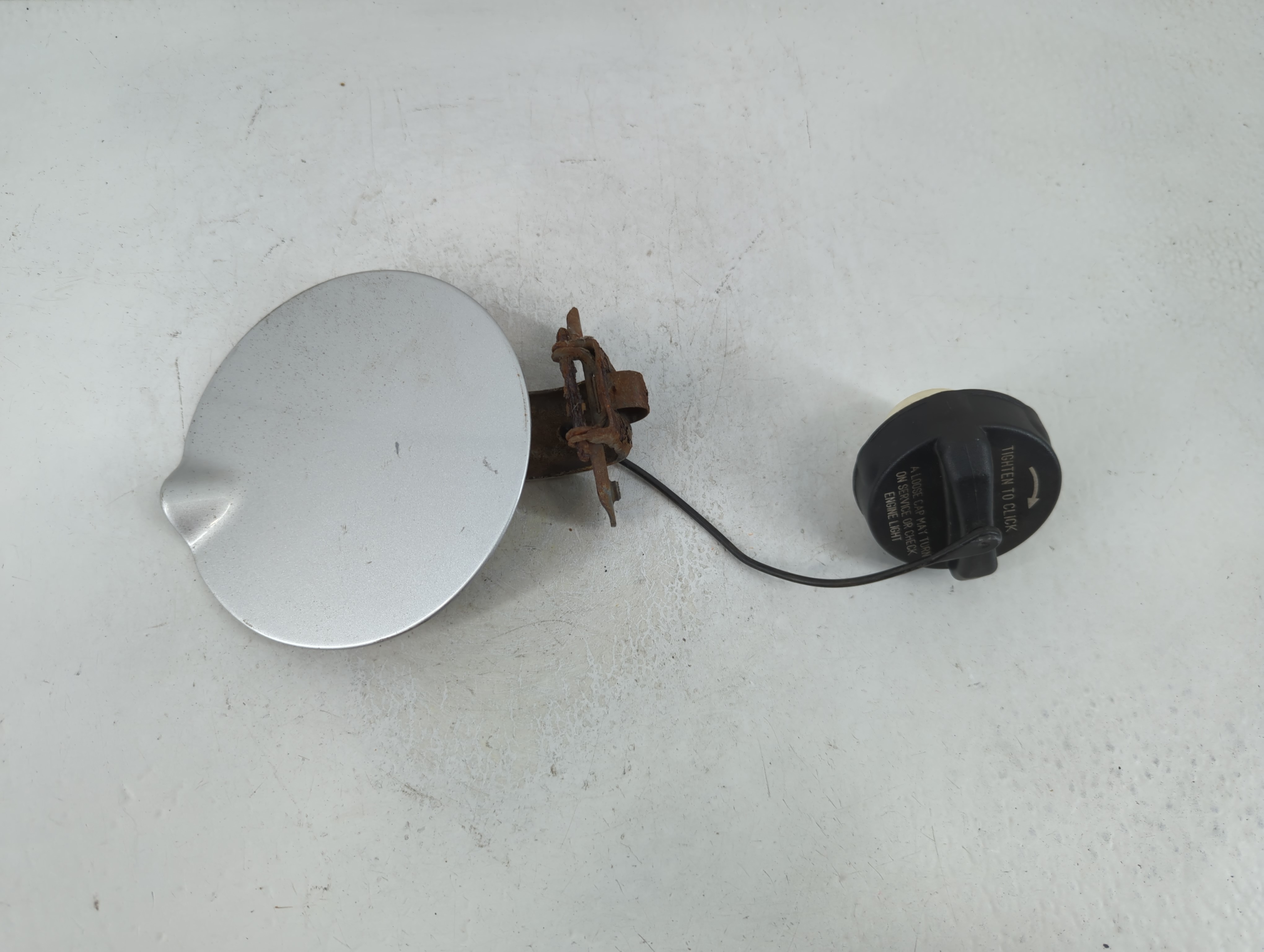 Picture of 2009 Dodge Caliber Fuel Tank Door Lid Gas Tank Silver 1065798