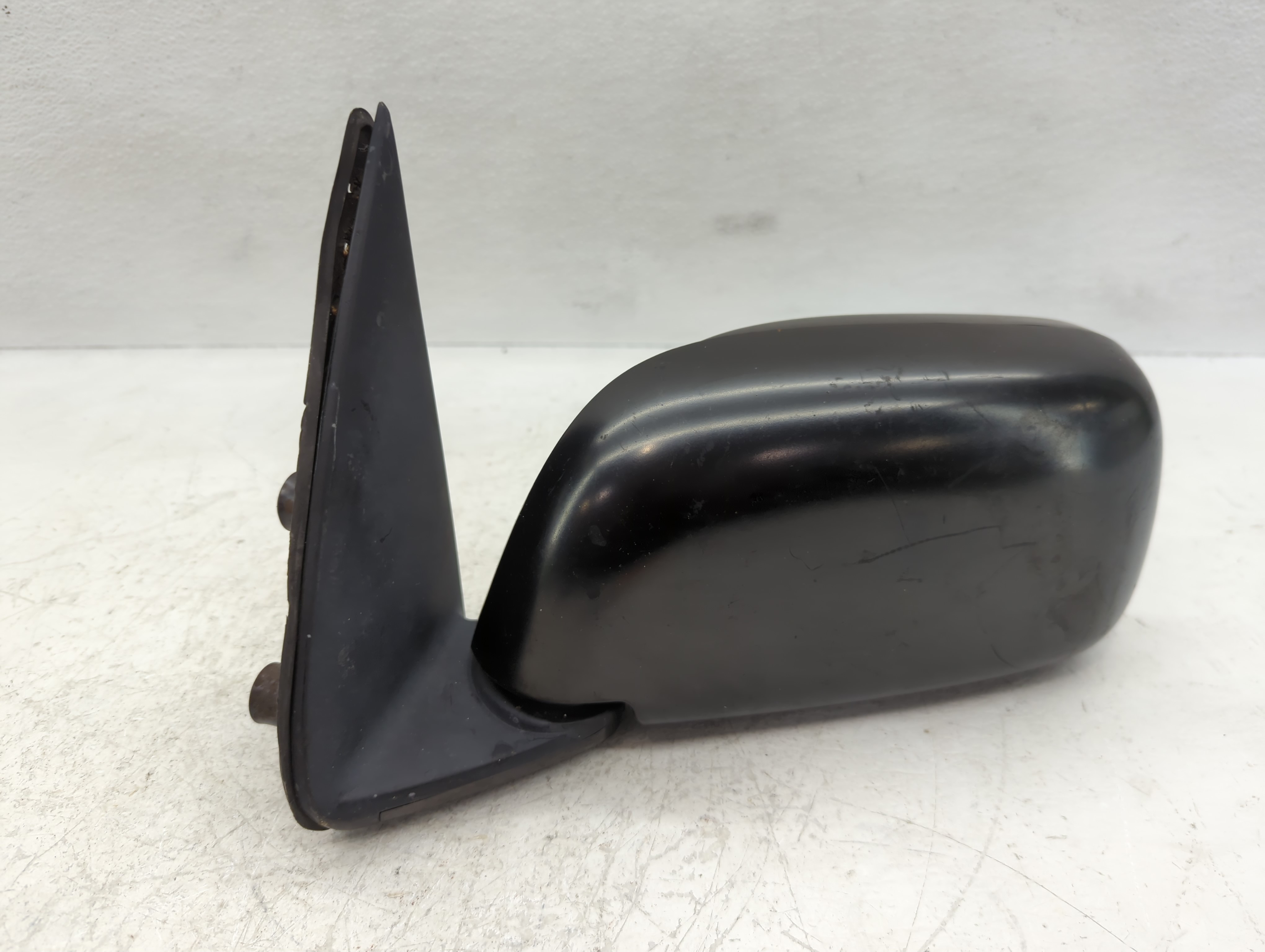 1995-1999 Toyota Tacoma Driver Left Side View Manual Door Mirror Red 1074958 - Oemusedautoparts1.com
