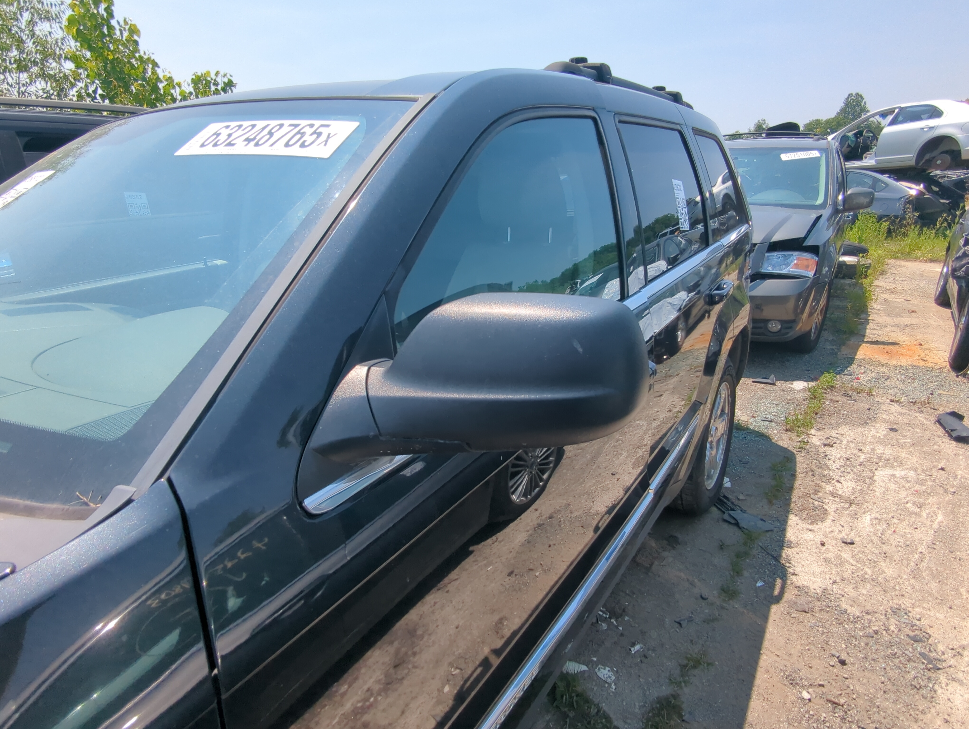 2005-2010 Jeep Grand Cherokee Driver Left Side View Power Door Mirror 1091248 - Oemusedautoparts1.com