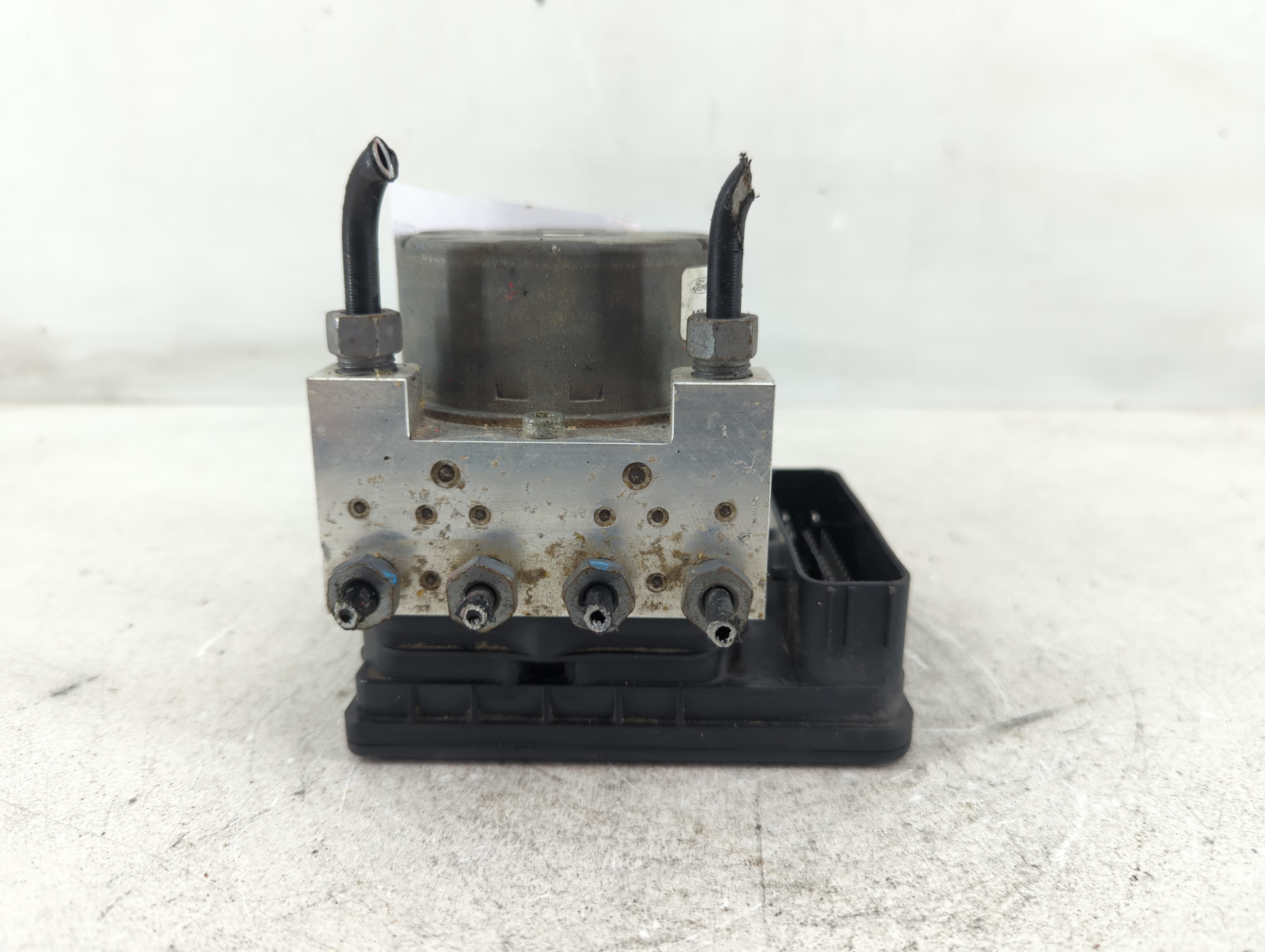 2014-2016 Ford Fusion Abs Pump Control Module 1099158 - Oemusedautoparts1.com