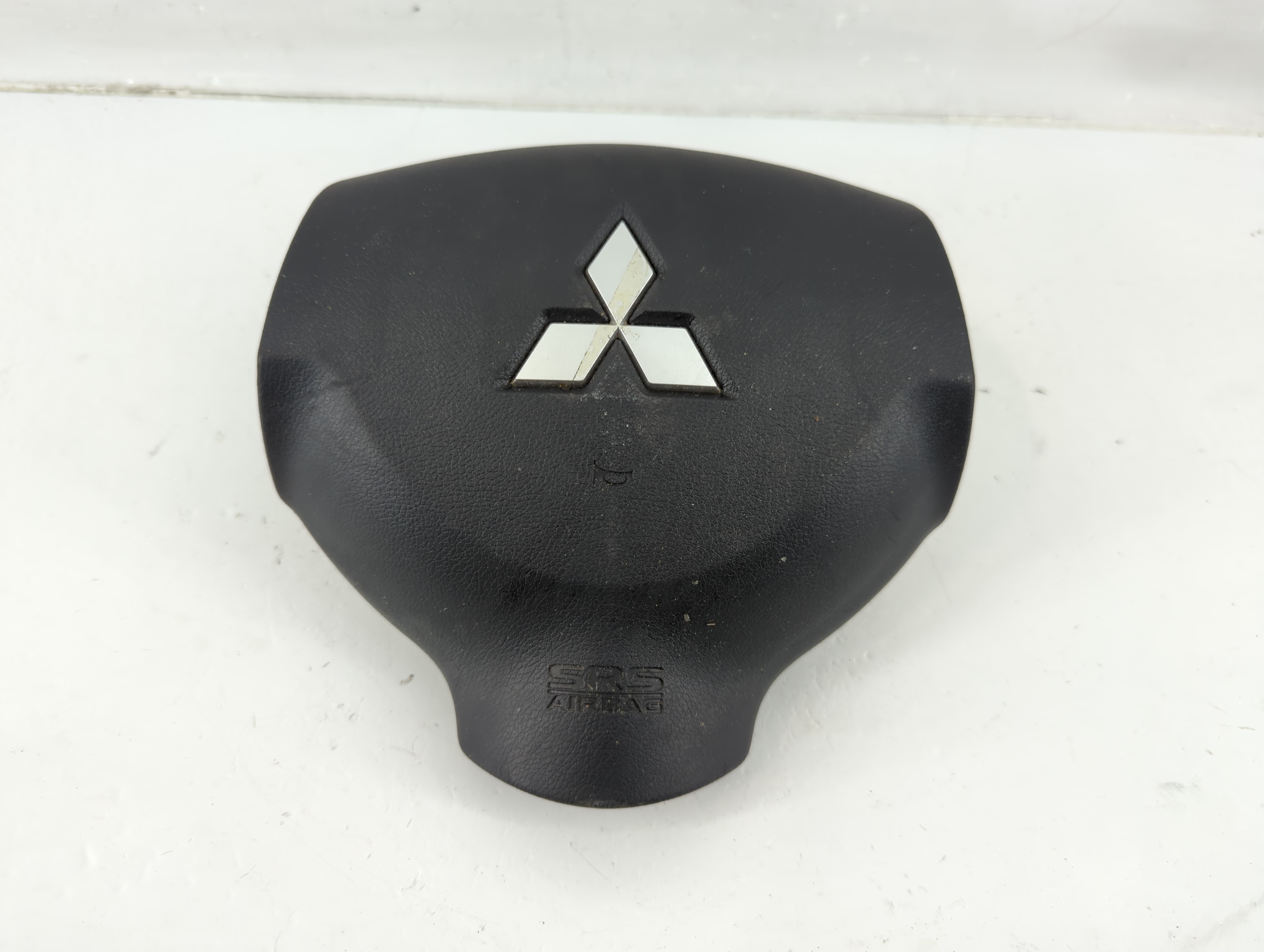 2007 Mitsubishi Outlander Air Bag Driver Left Steering Wheel Mounted 1138415 - Oemusedautoparts1.com