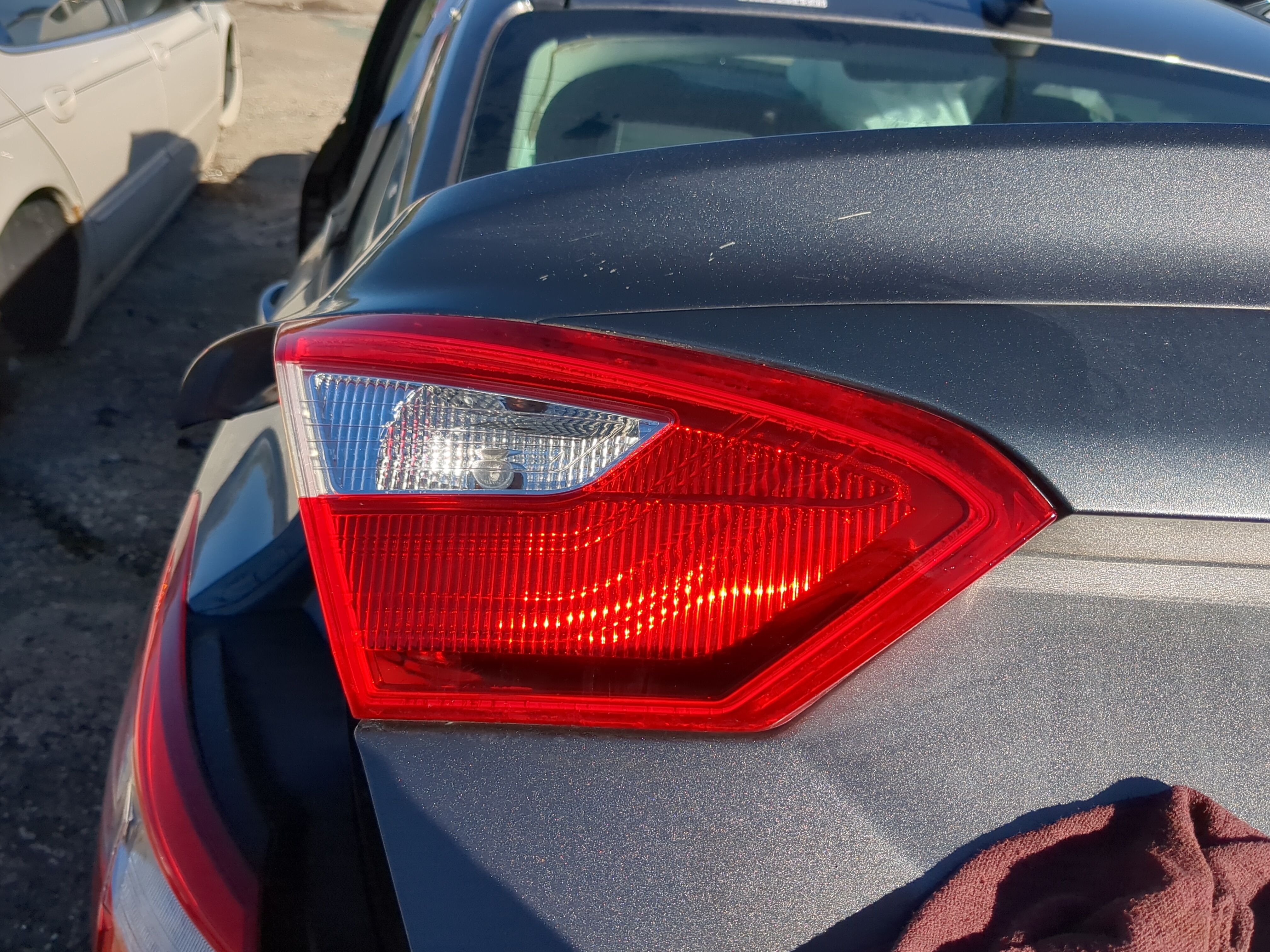 Picture of 2012 Ford Focus Driver Left Side Tail Light Taillight Deck Lid Mounted 1144145