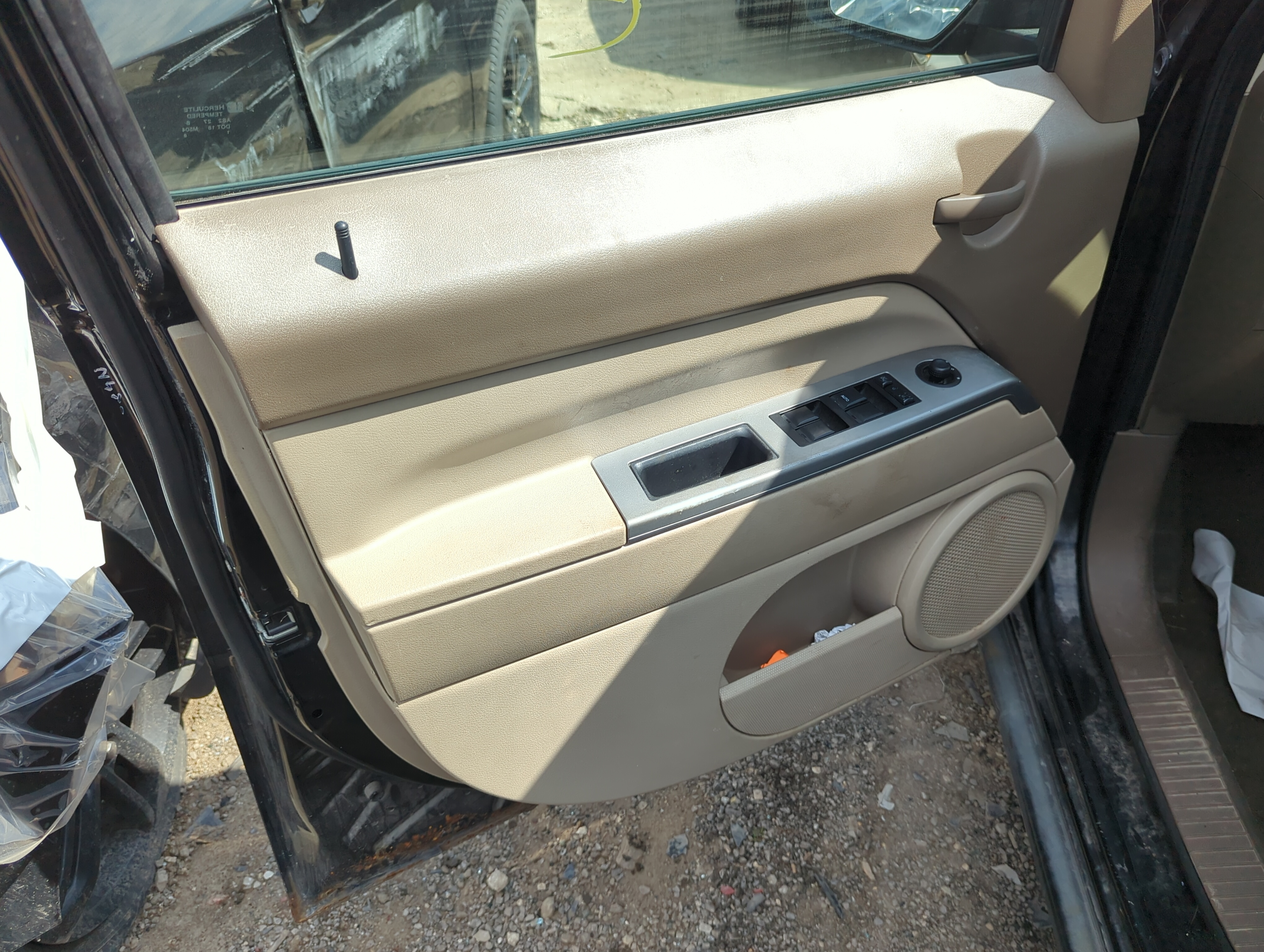 2007 Jeep Patriot Front Left Driver Interior Door Panel Trim 1147488 - Oemusedautoparts1.com