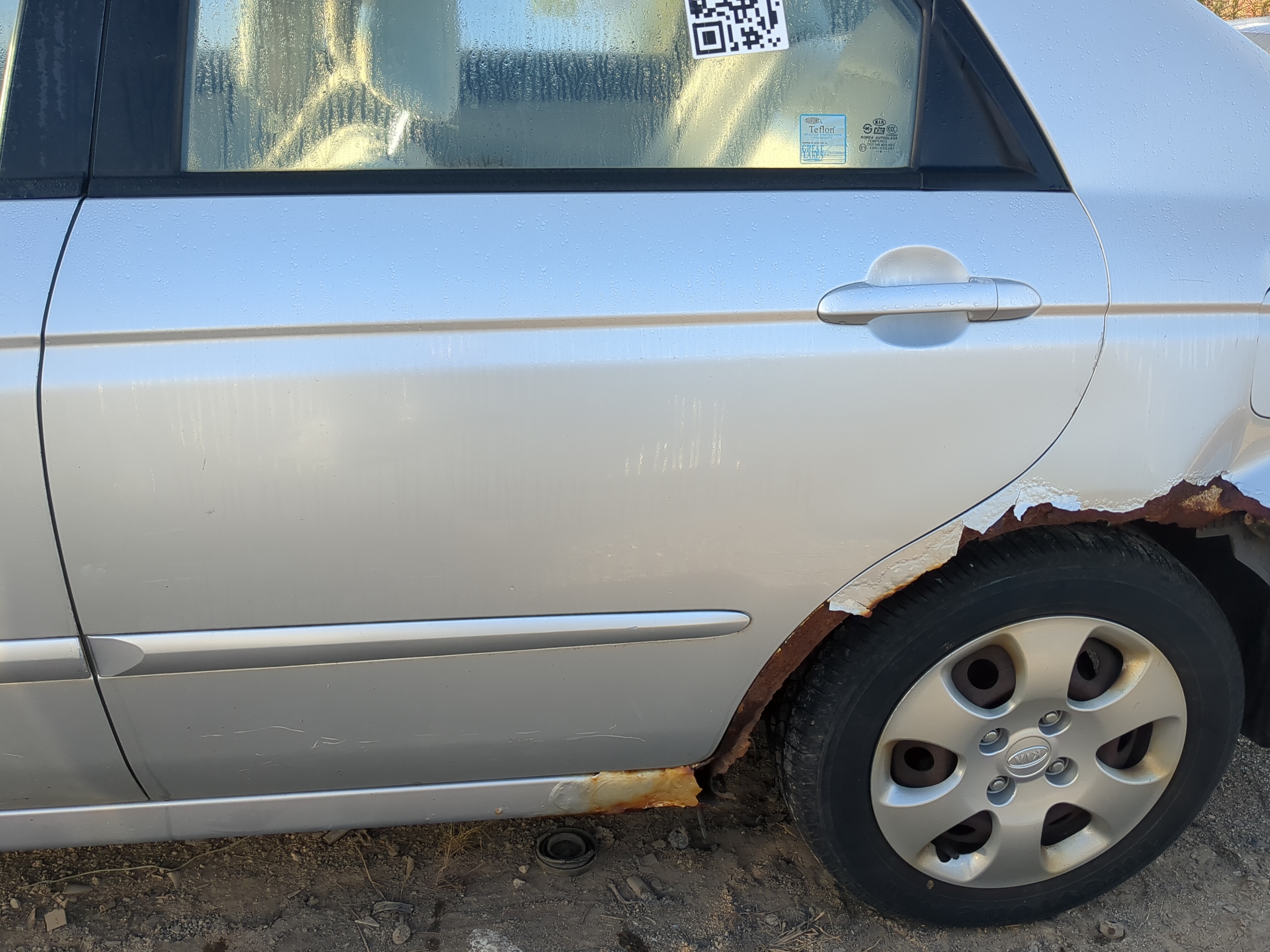 2004-2009 Kia Spectra Driver Rear Door Oem 1184269 - Oemusedautoparts1.com