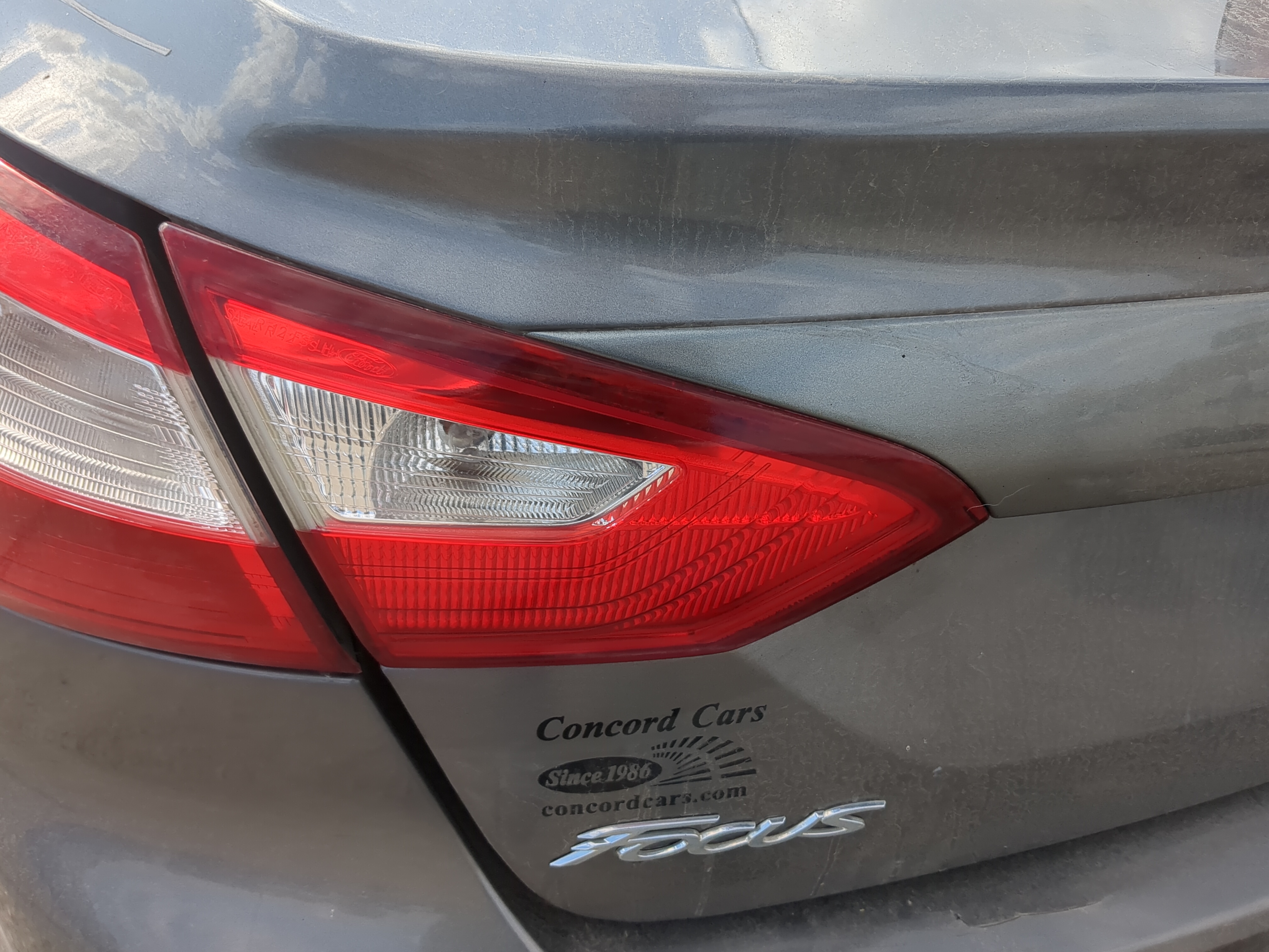 Picture of 2012 Ford Focus Driver Left Side Tail Light Taillight Deck Lid Mounted 1185780