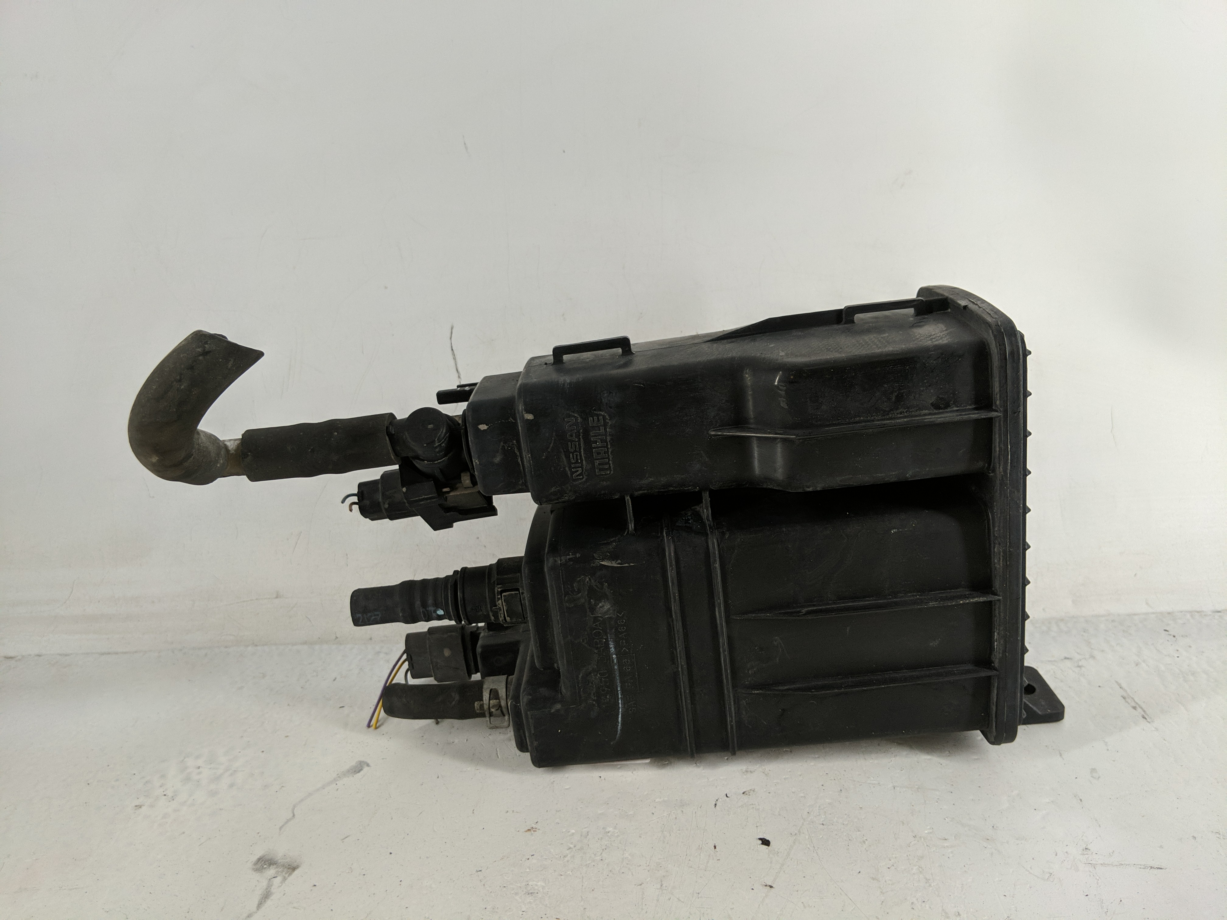 2012 Nissan Versa Fuel Vapor Charcoal Canister 1188092 - Oemusedautoparts1.com