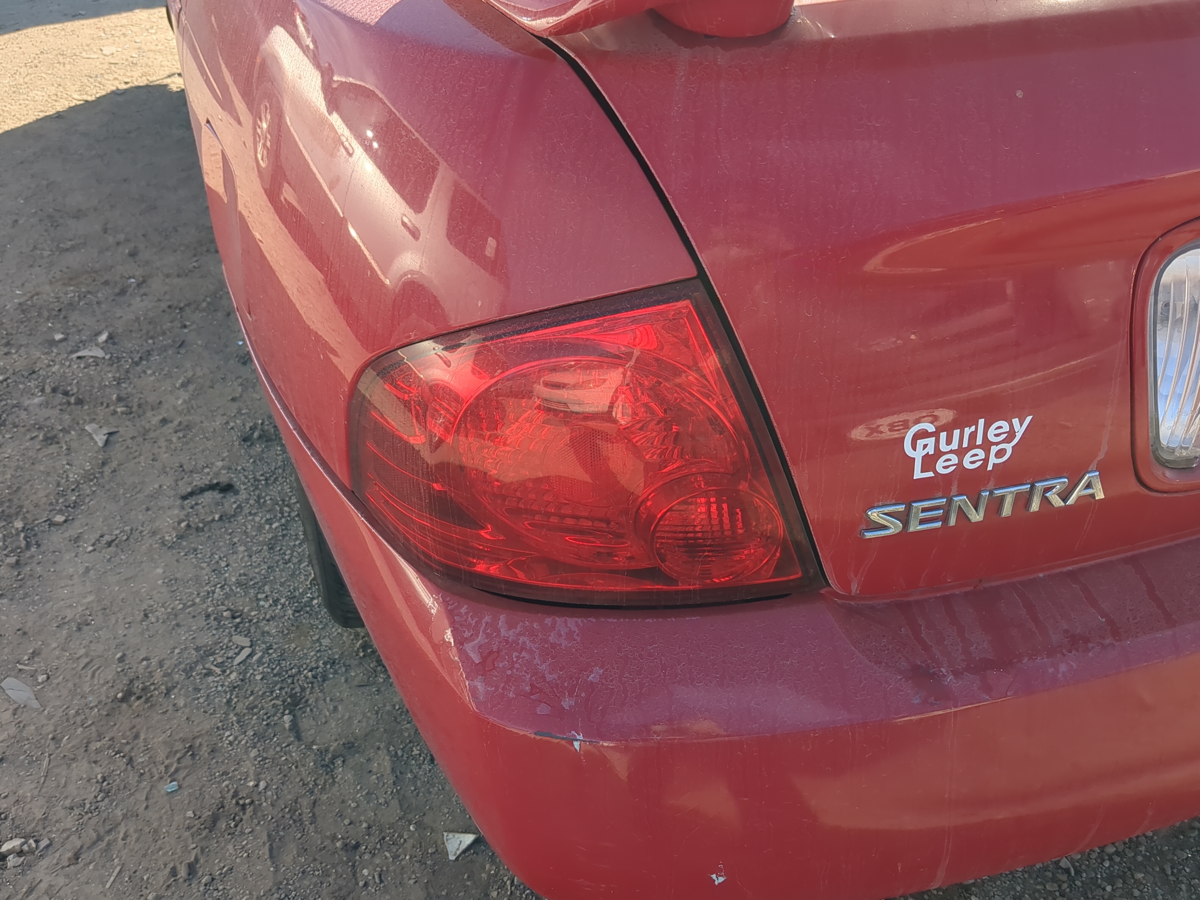 Picture of 2004-2006 Nissan Sentra Driver Left Side Tail Light Taillight Oem 1195864