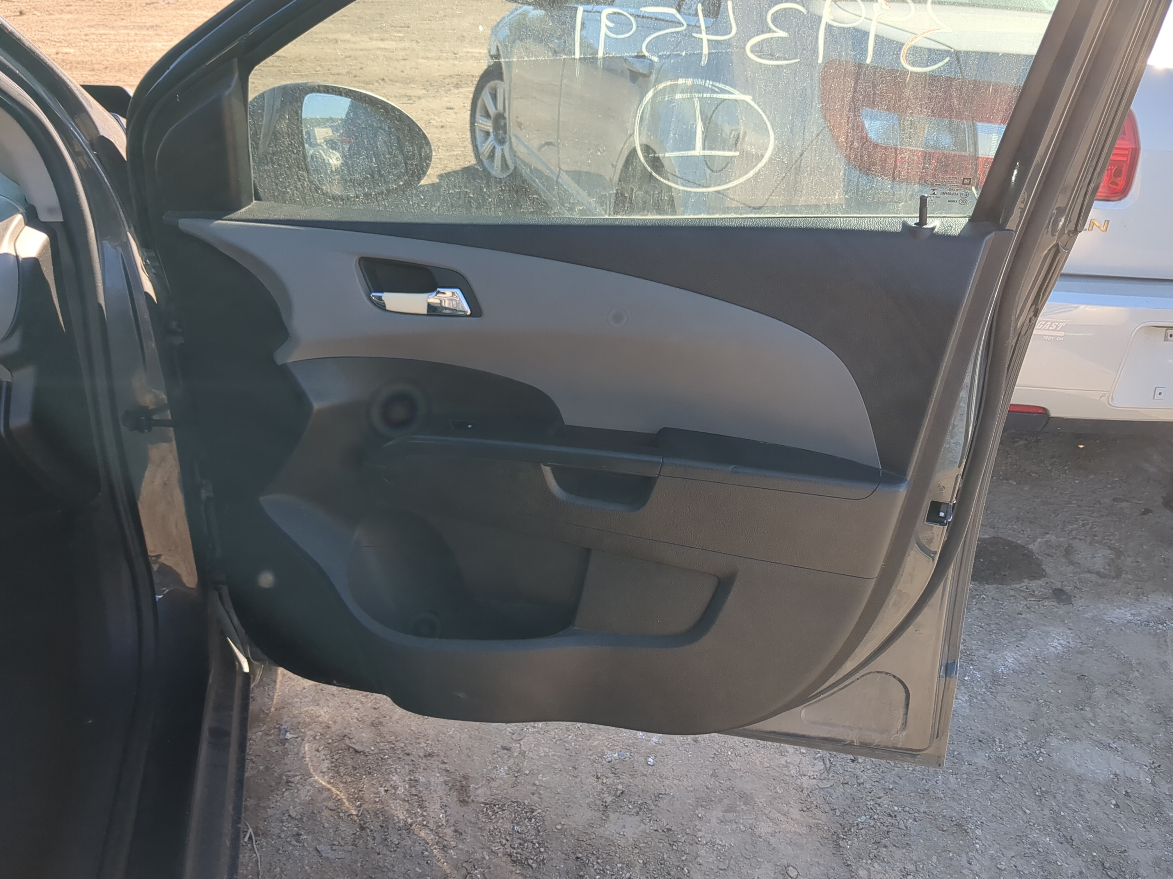 Picture of 2013 Chevrolet Sonic Front Right Passenger Interior Door Panel Trim 1202199