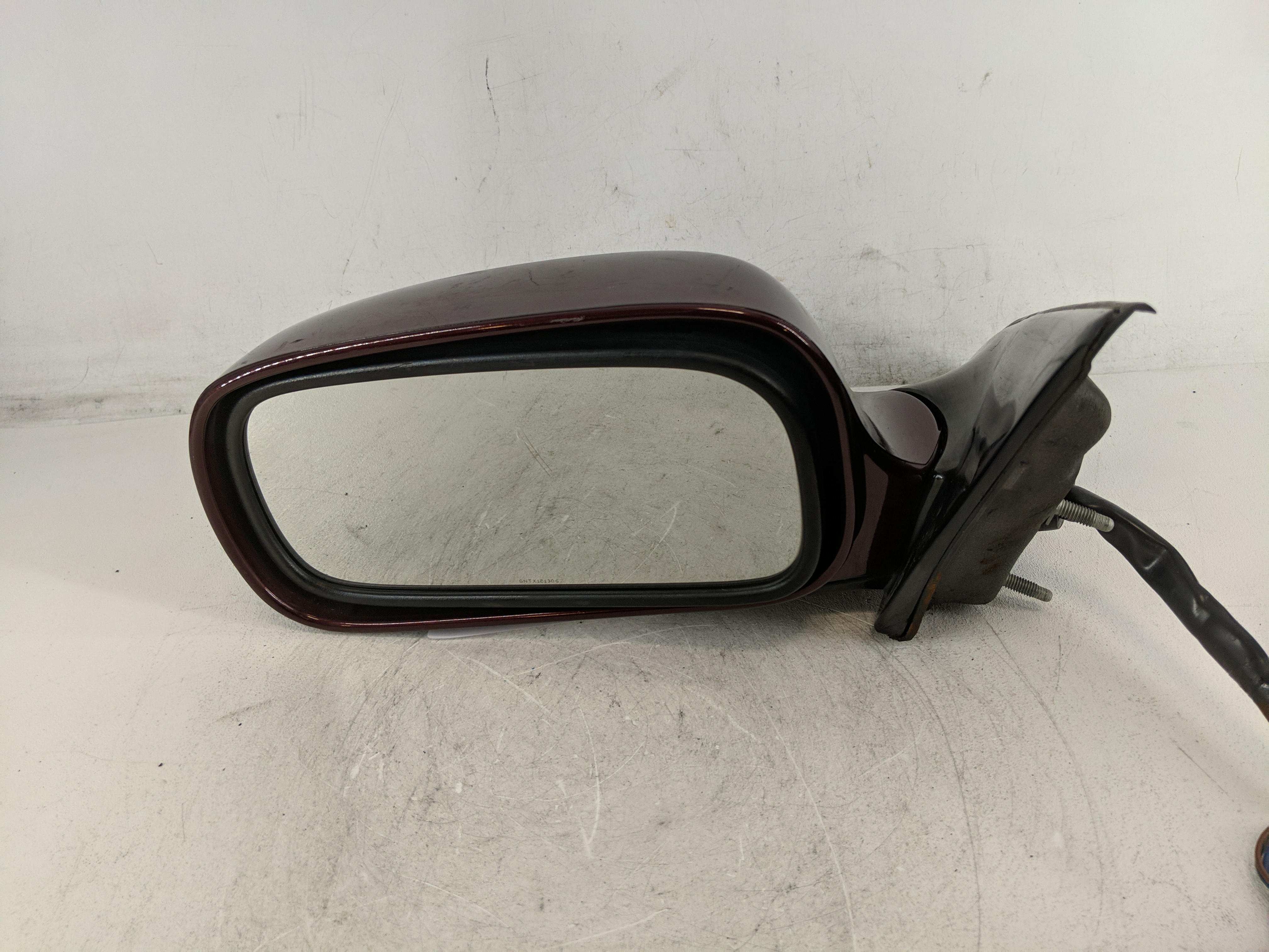 2006-2007 Buick Lucerne Driver Left Side View Power Door Mirror Dark Red 1202914 - Oemusedautoparts1.com
