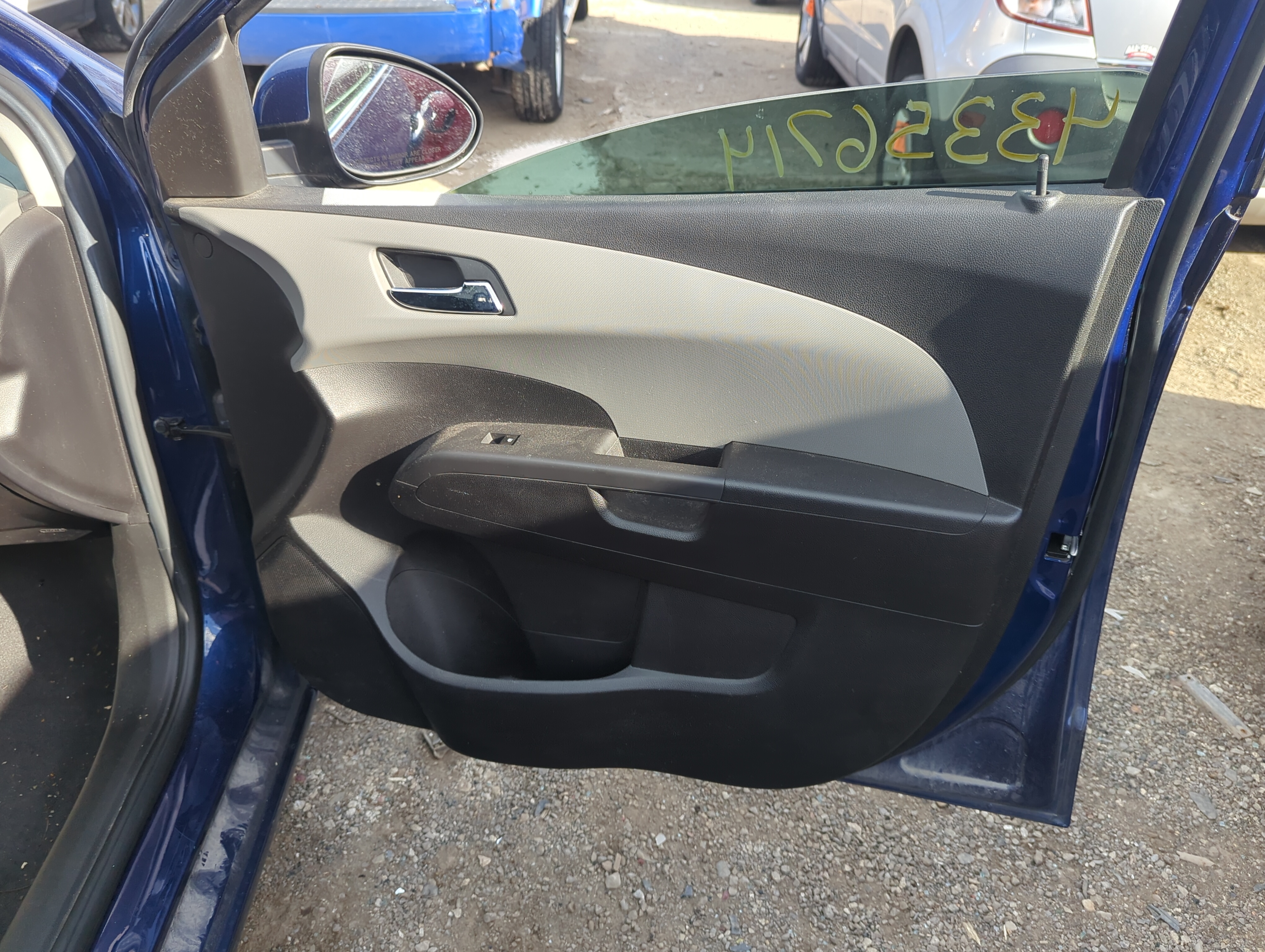 Picture of 2014 Chevrolet Sonic Front Right Passenger Interior Door Panel Trim 1226798