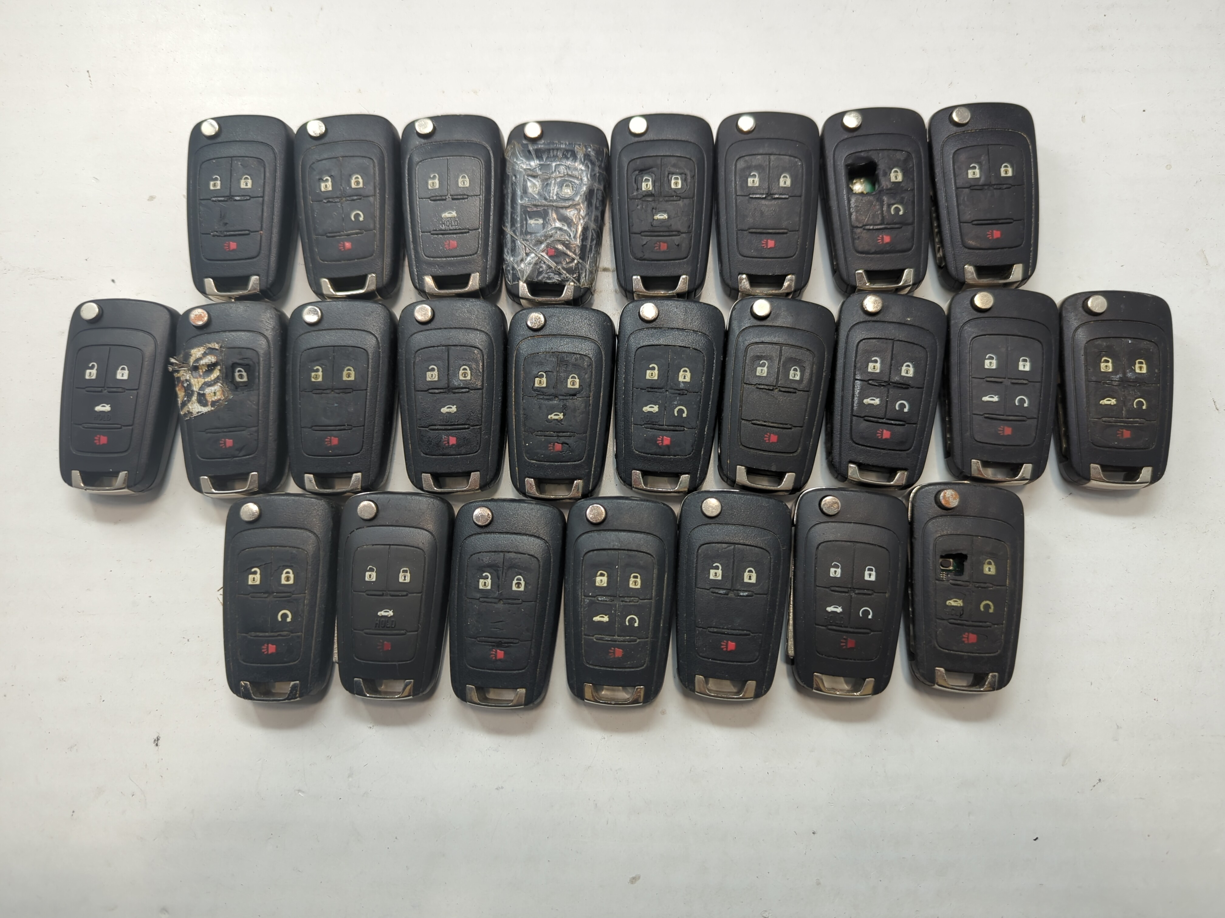 Lot of 25 Chevrolet Keyless Entry Remote Fob MIXED FCC IDS MIXED PART 685676 - Oemusedautoparts1.com
