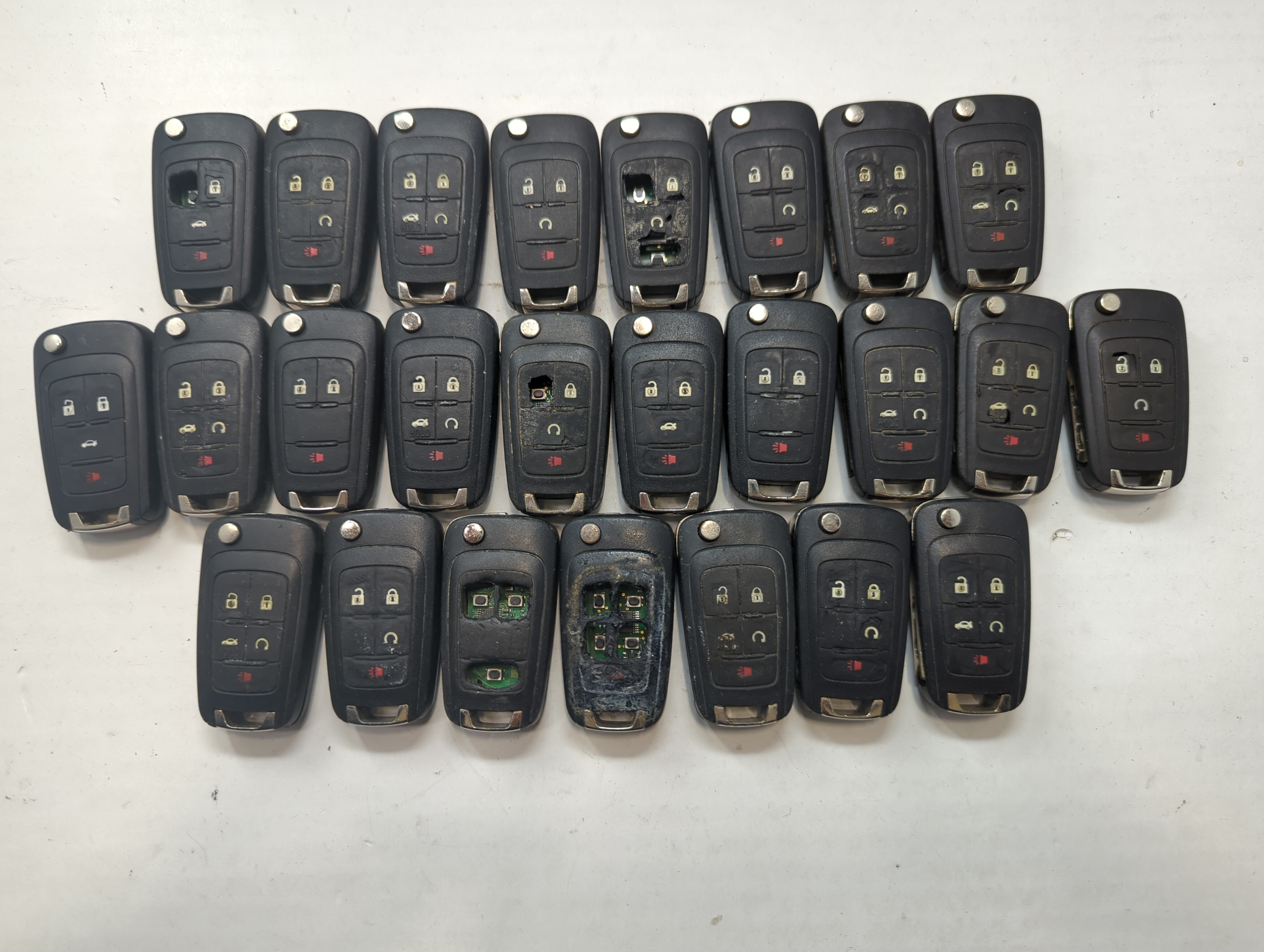 Lot of 25 Chevrolet Keyless Entry Remote Fob MIXED FCC IDS MIXED PART 685802 - Oemusedautoparts1.com