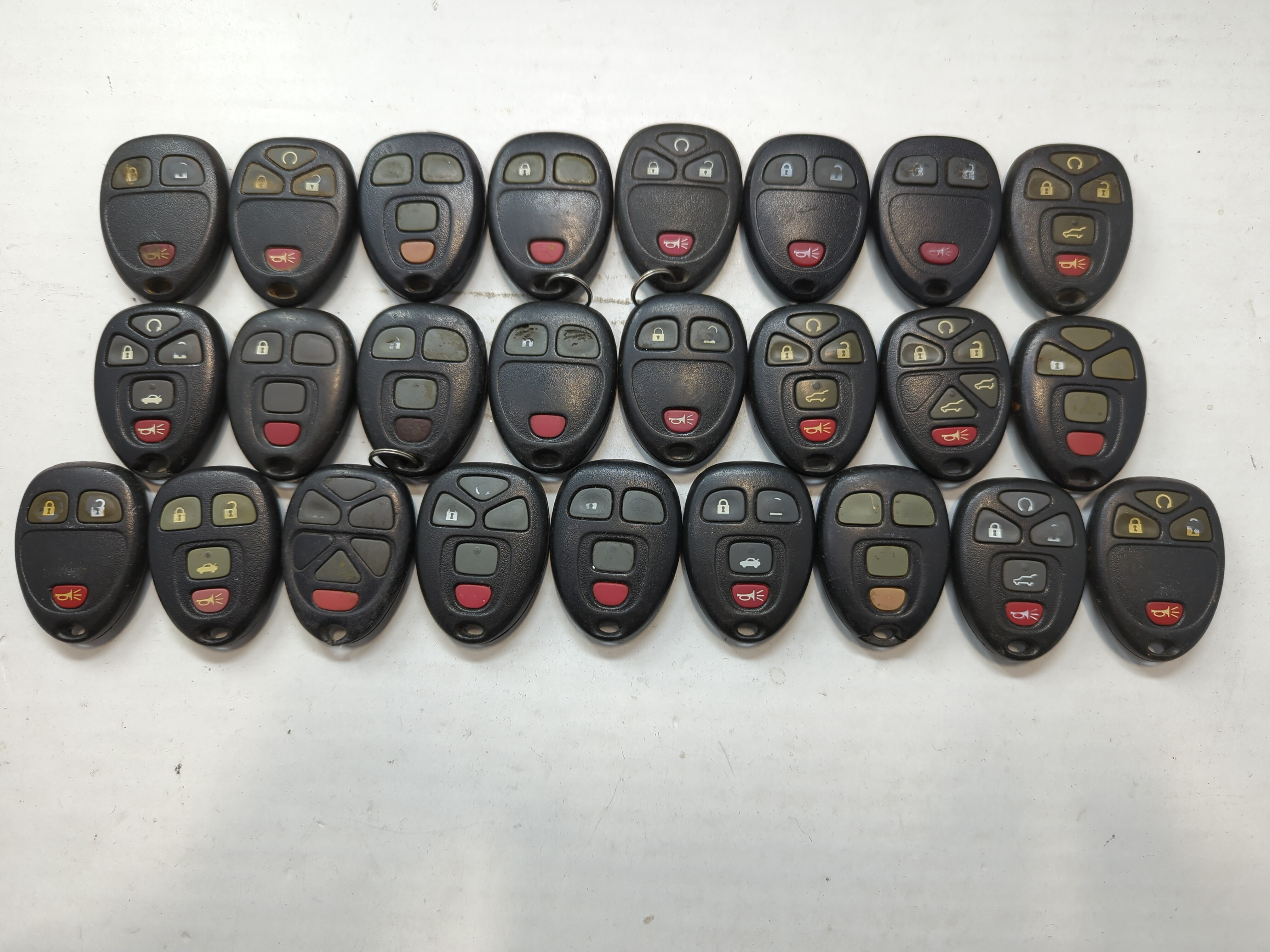 Lot of 25 Chevrolet Keyless Entry Remote Fob MIXED FCC IDS MIXED PART 722027 - Oemusedautoparts1.com