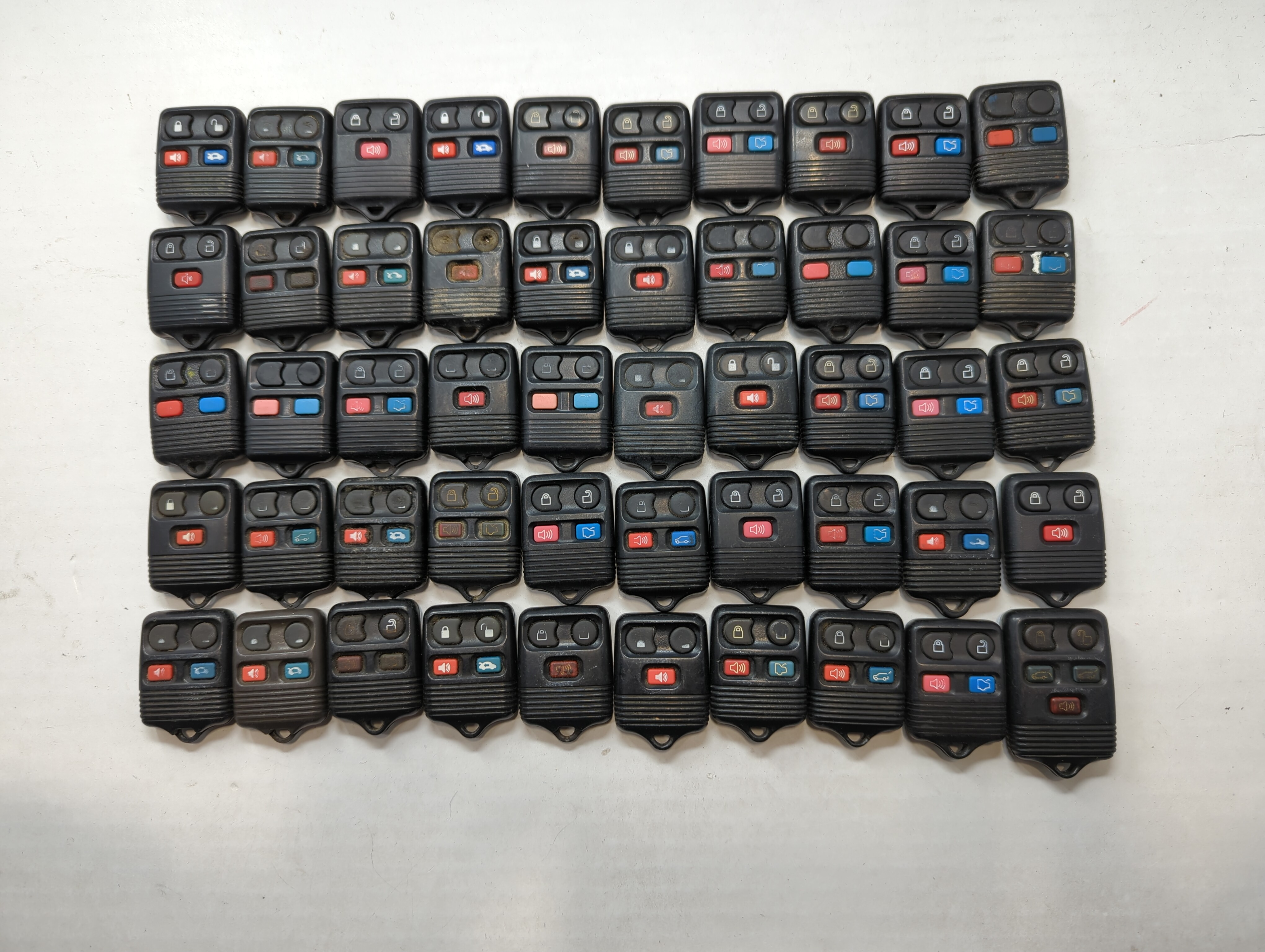 Lot of 50 Ford Keyless Entry Remote Fob MIXED FCC IDS MIXED PART NUMBERS 722038 - Oemusedautoparts1.com