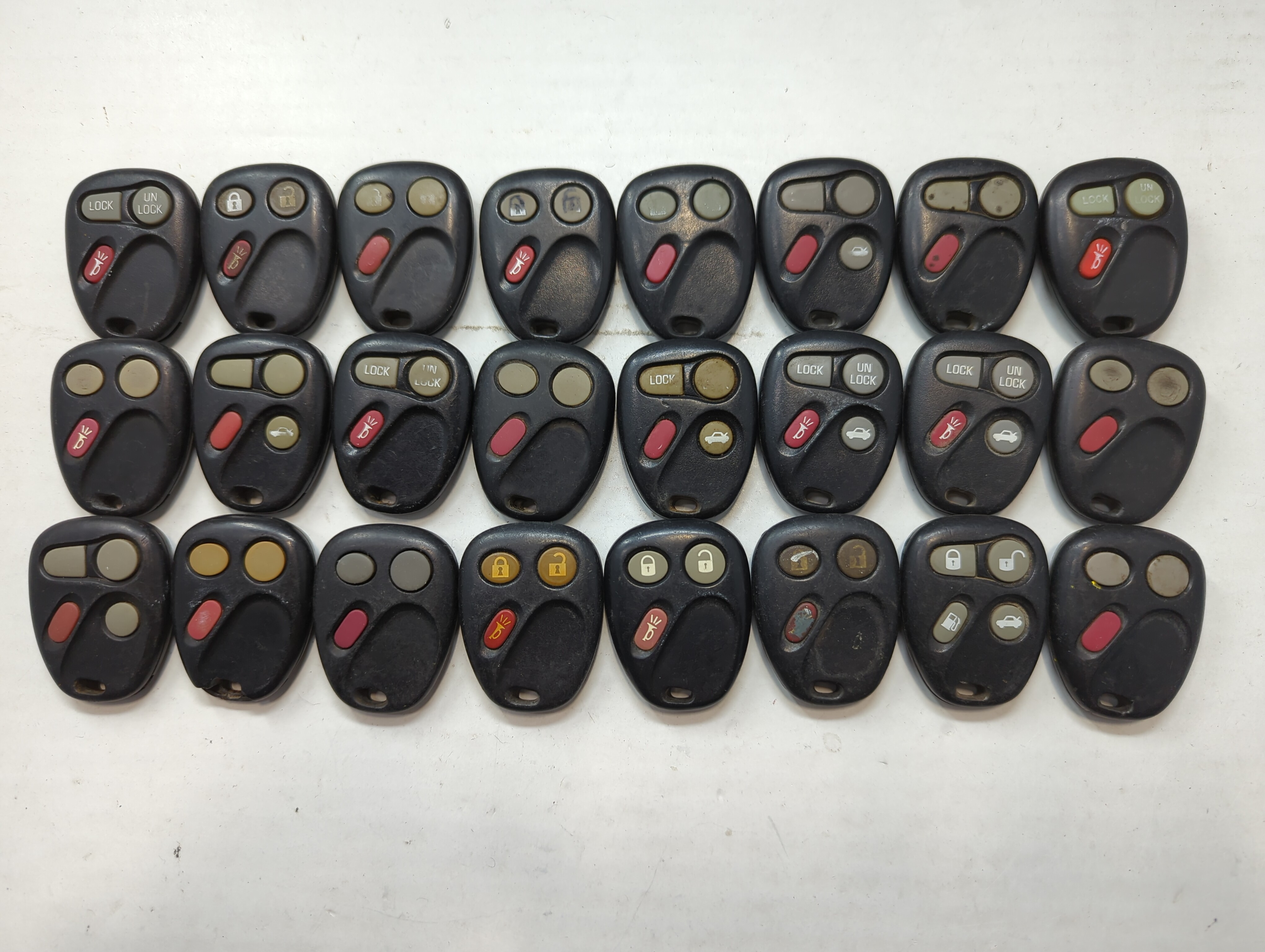 Lot of 24 Chevrolet Keyless Entry Remote Fob MIXED FCC IDS MIXED PART 722303 - Oemusedautoparts1.com