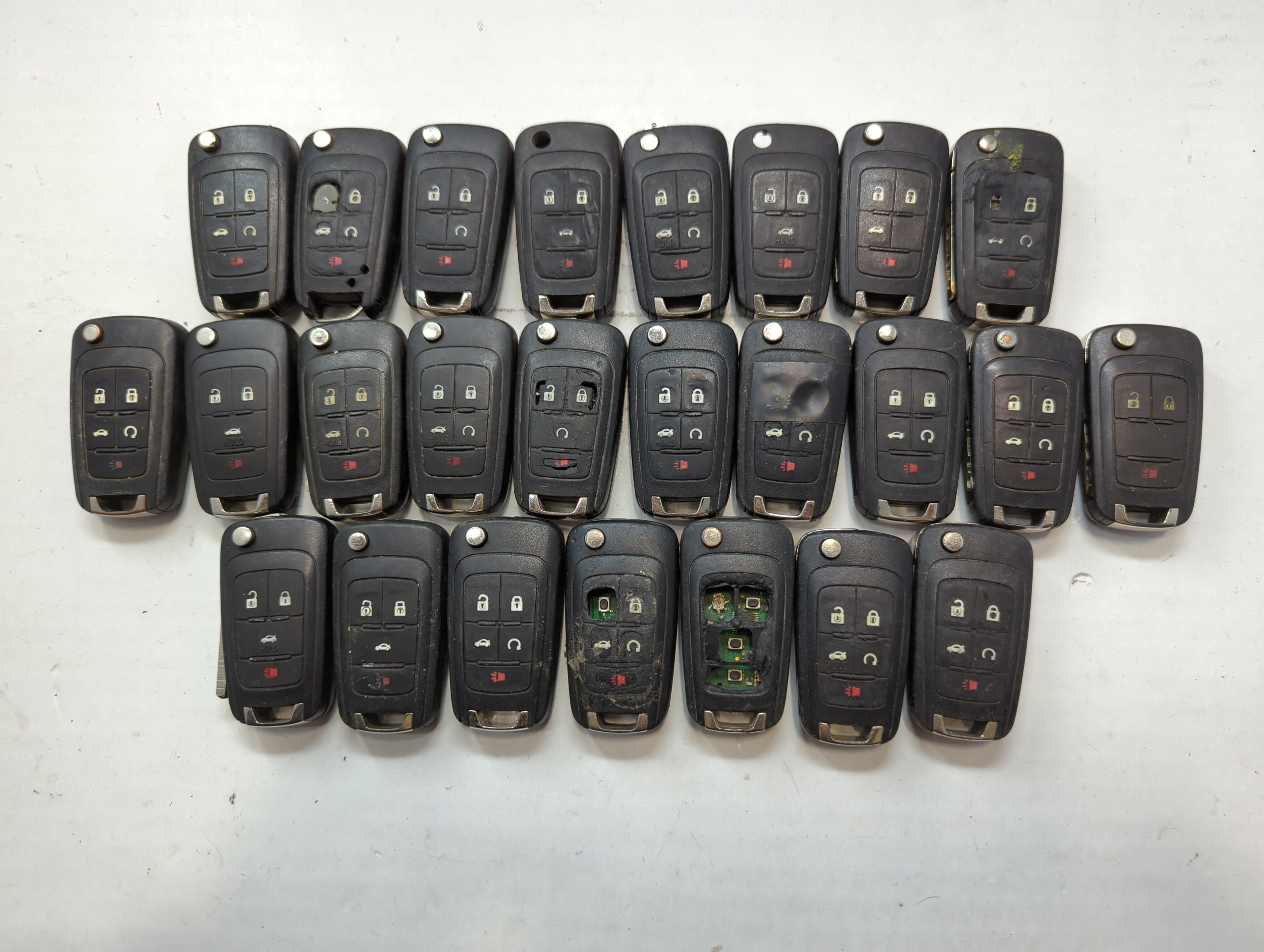 Lot of 25 Chevrolet Keyless Entry Remote Fob MIXED FCC IDS MIXED PART 722306 - Oemusedautoparts1.com
