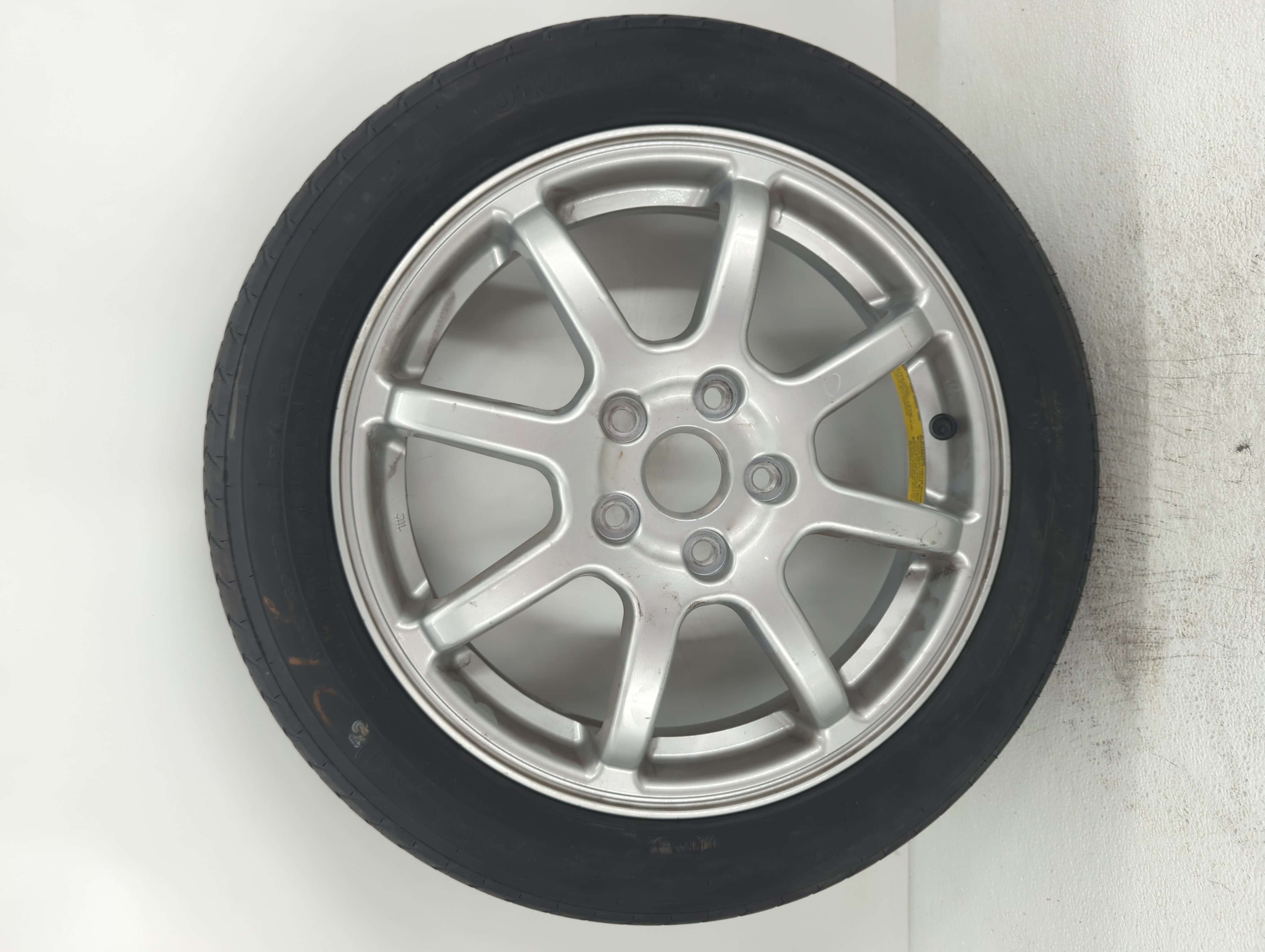Picture of Subaru Legacy Spare Donut Tire Wheel Rim Oem 749722