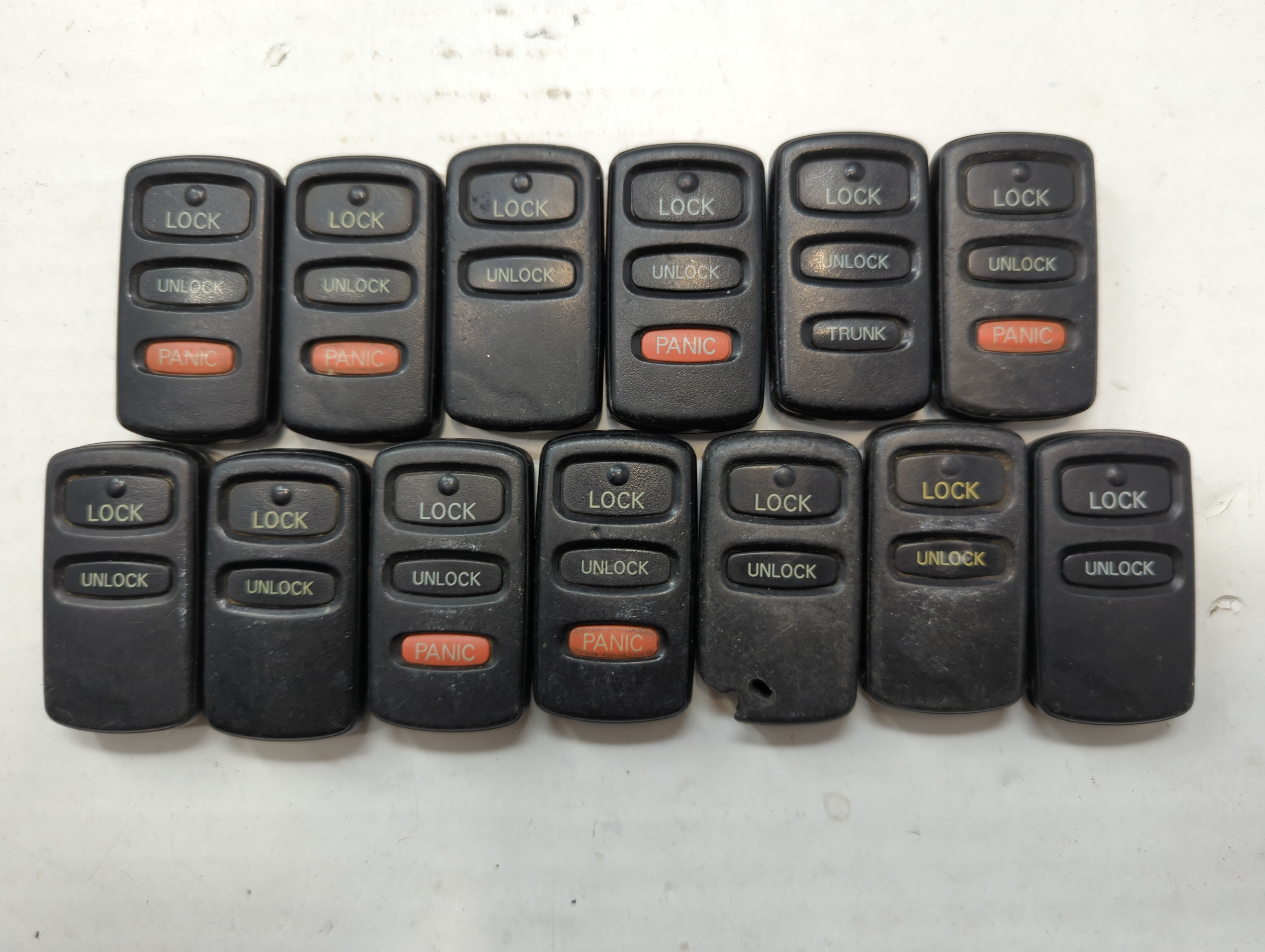 Picture of Lot of 13 Mitsubishi Keyless Entry Remote Fob MIXED FCC IDS 757519