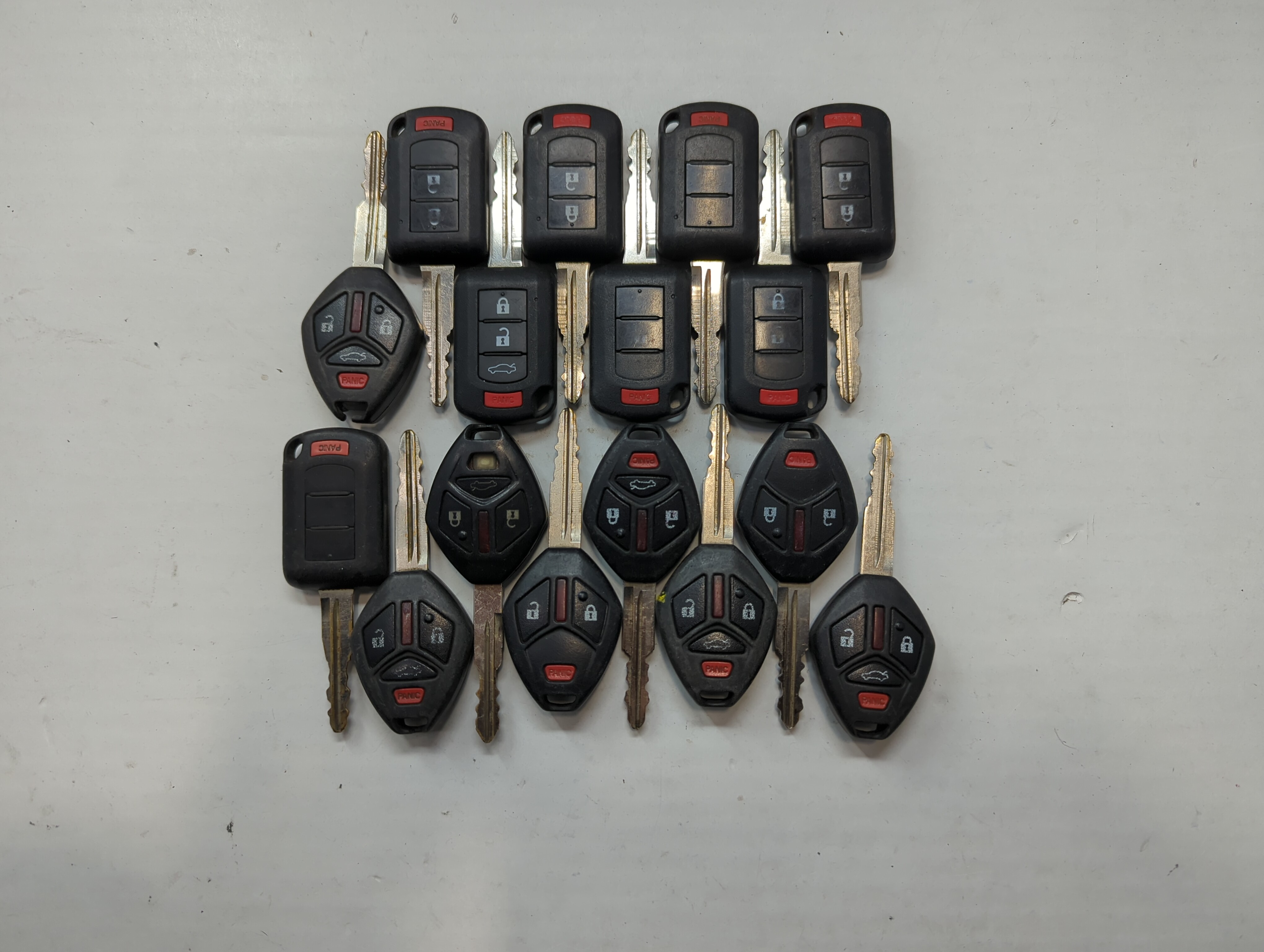 Picture of Lot of 16 Mitsubishi Keyless Entry Remote Fob MIXED FCC IDS MIXED PART 757589