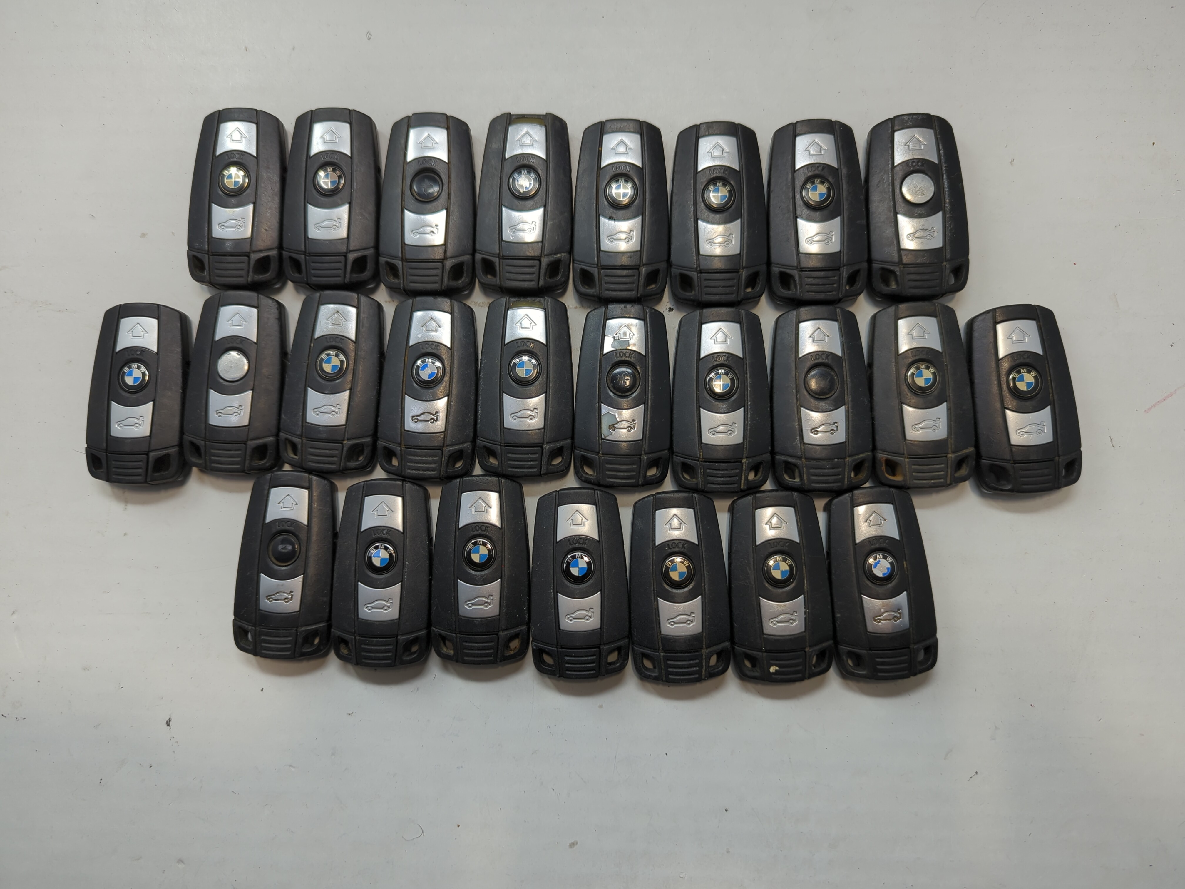 Lot of 25 Bmw Keyless Entry Remote Fob MIXED FCC IDS MIXED PART NUMBERS 757705 - Oemusedautoparts1.com