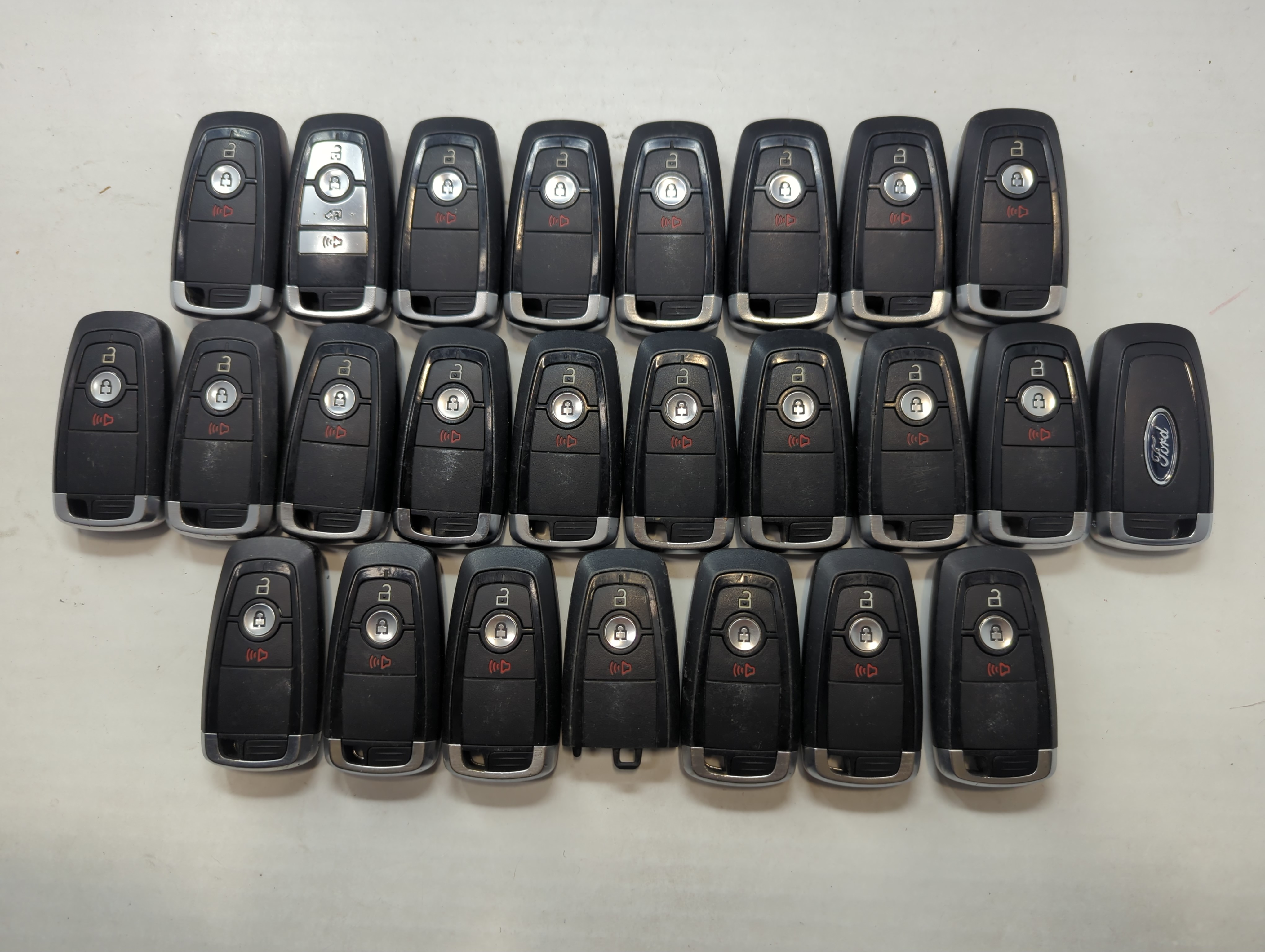 Lot of 24 Ford Keyless Entry Remote Fob MIXED FCC IDS MIXED PART NUMBERS 758918 - Oemusedautoparts1.com