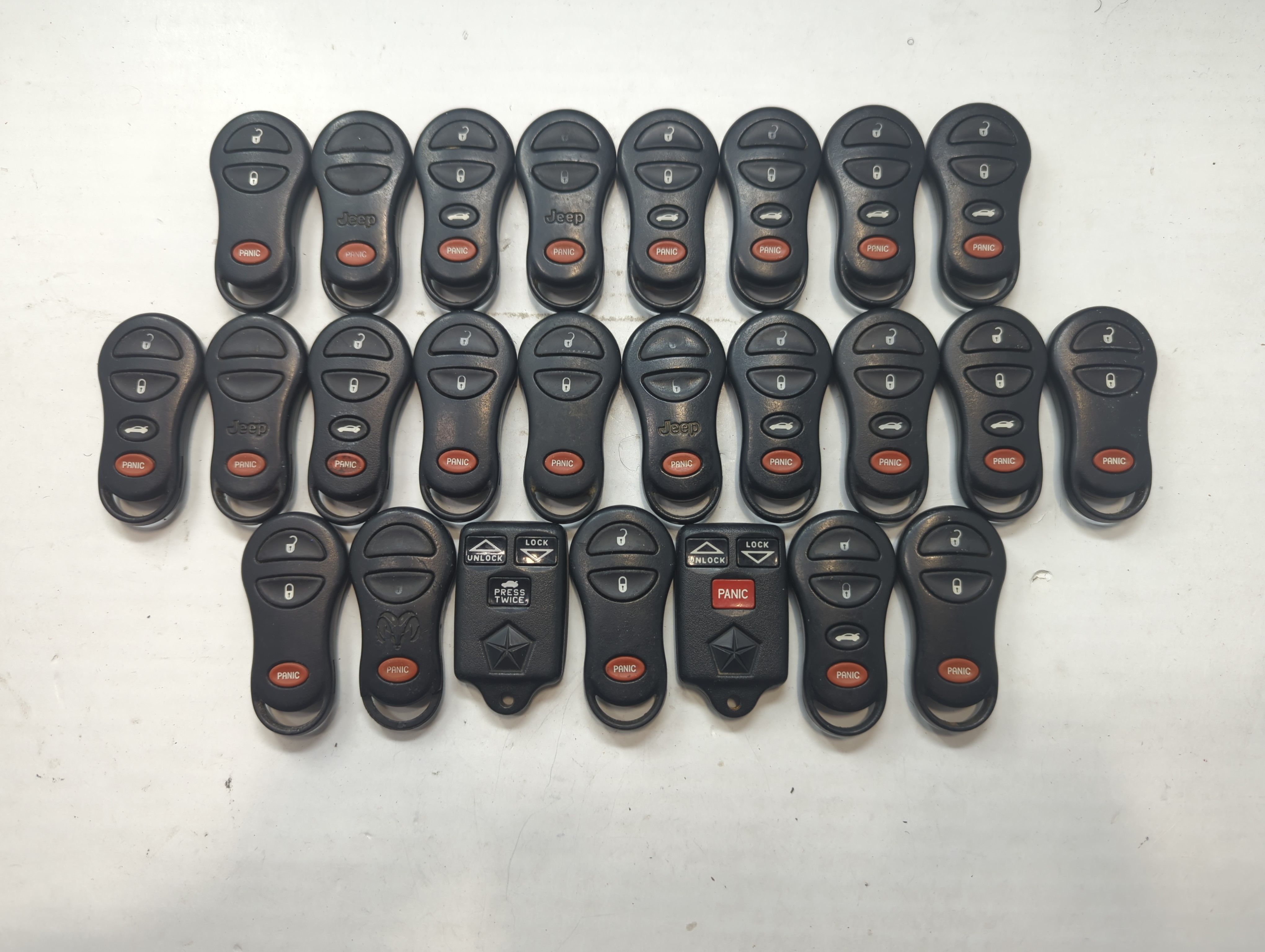 Lot of 25 Dodge Keyless Entry Remote Fob MIXED FCC IDS MIXED PART NUMBERS 758942 - Oemusedautoparts1.com