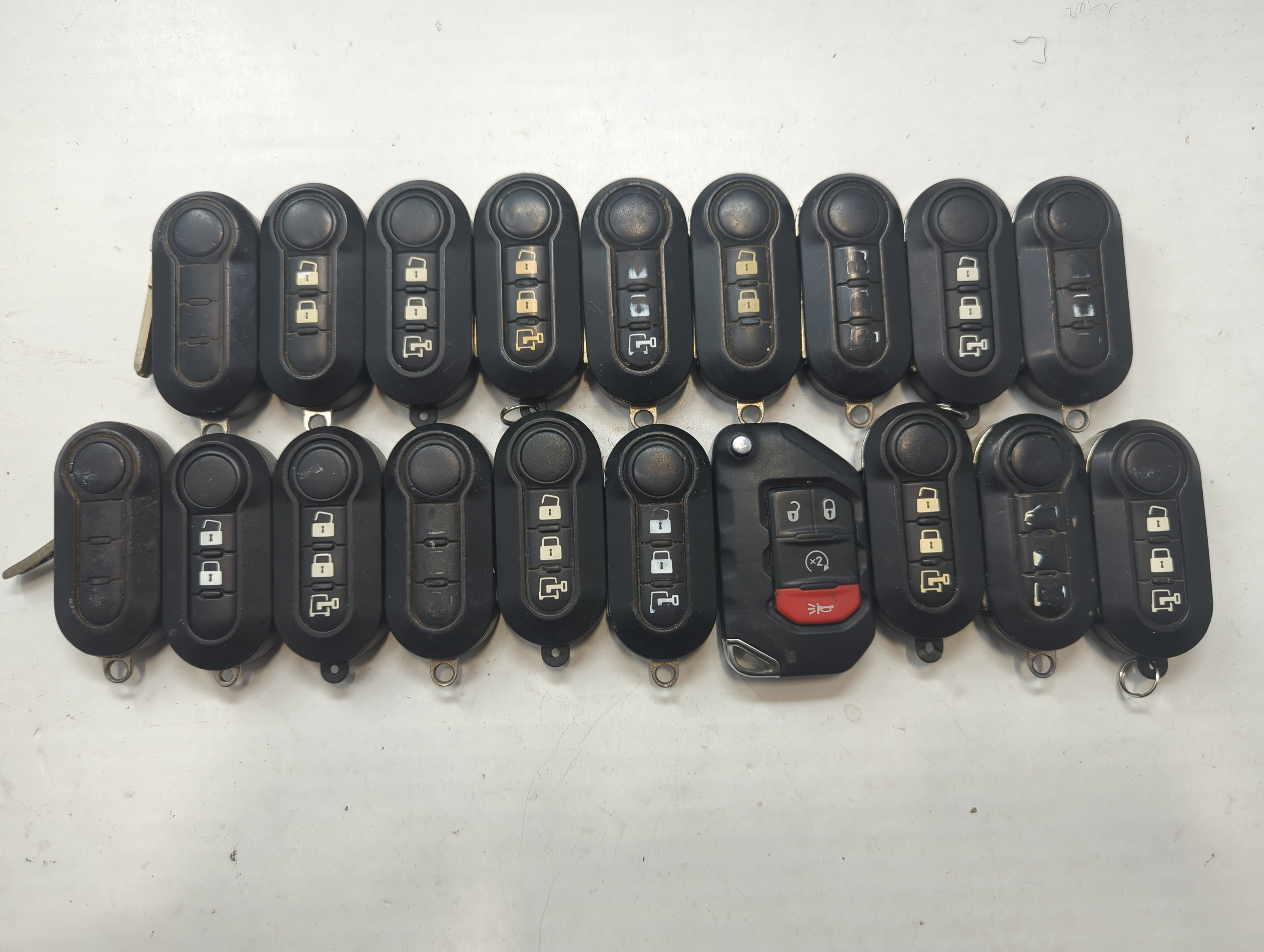 Lot of 19 Dodge Keyless Entry Remote Fob MIXED FCC IDS MIXED PART NUMBERS 758950 - Oemusedautoparts1.com