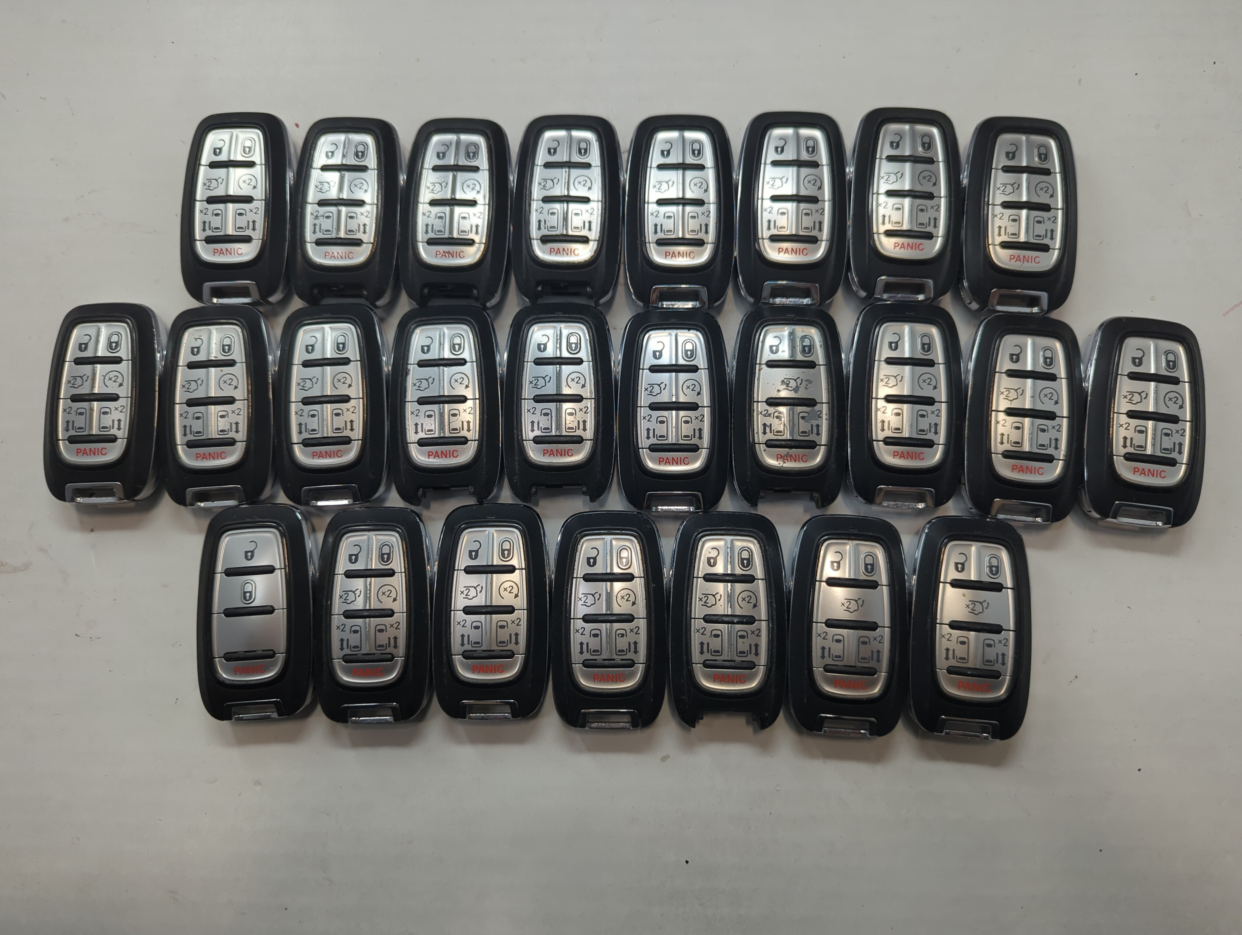 Lot of 25 Chrysler Keyless Entry Remote Fob MIXED FCC IDS MIXED PART 758971 - Oemusedautoparts1.com