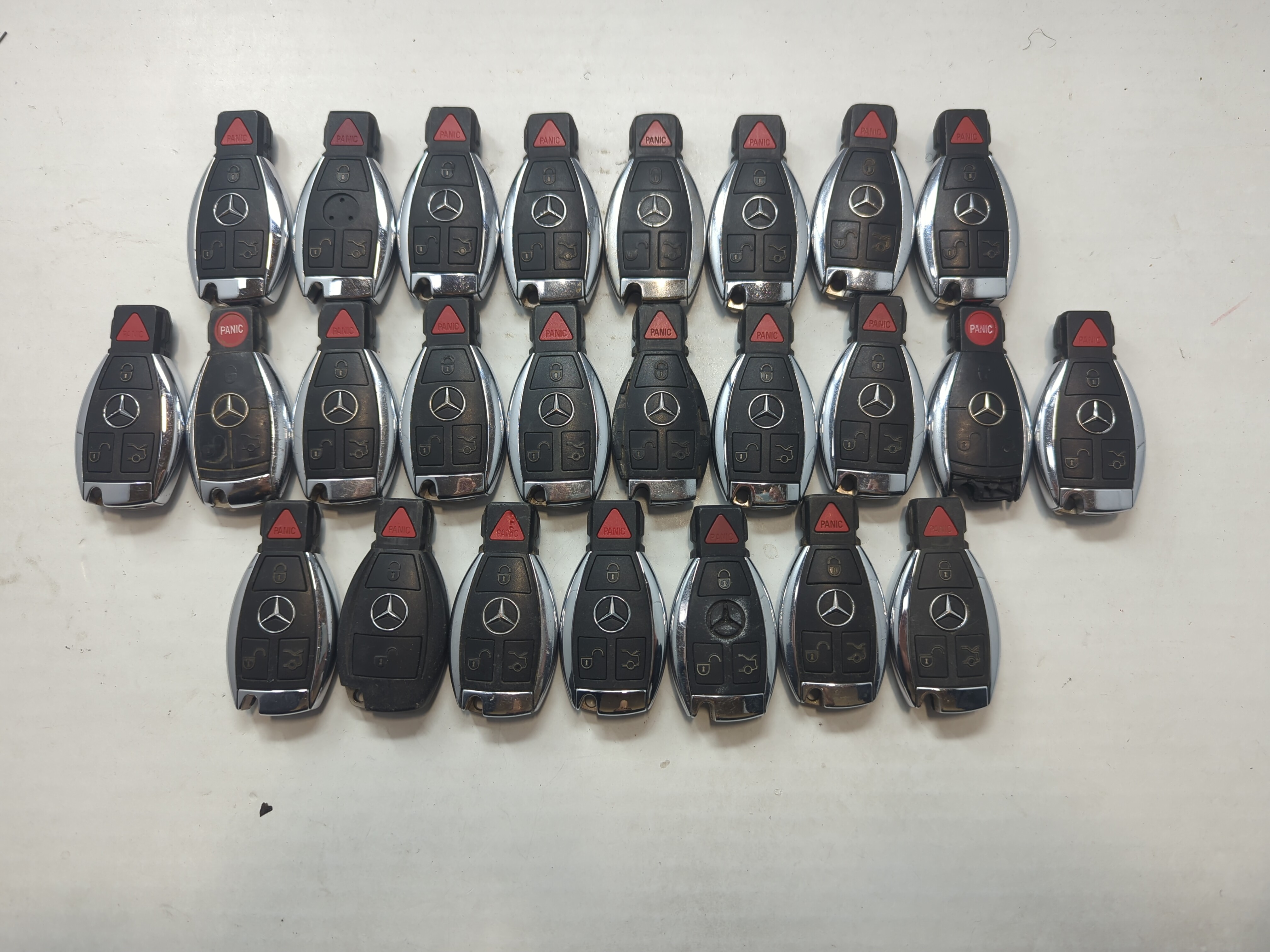 Lot of 25 Mercedes-Benz Keyless Entry Remote Fob MIXED FCC IDS MIXED 759065 - Oemusedautoparts1.com