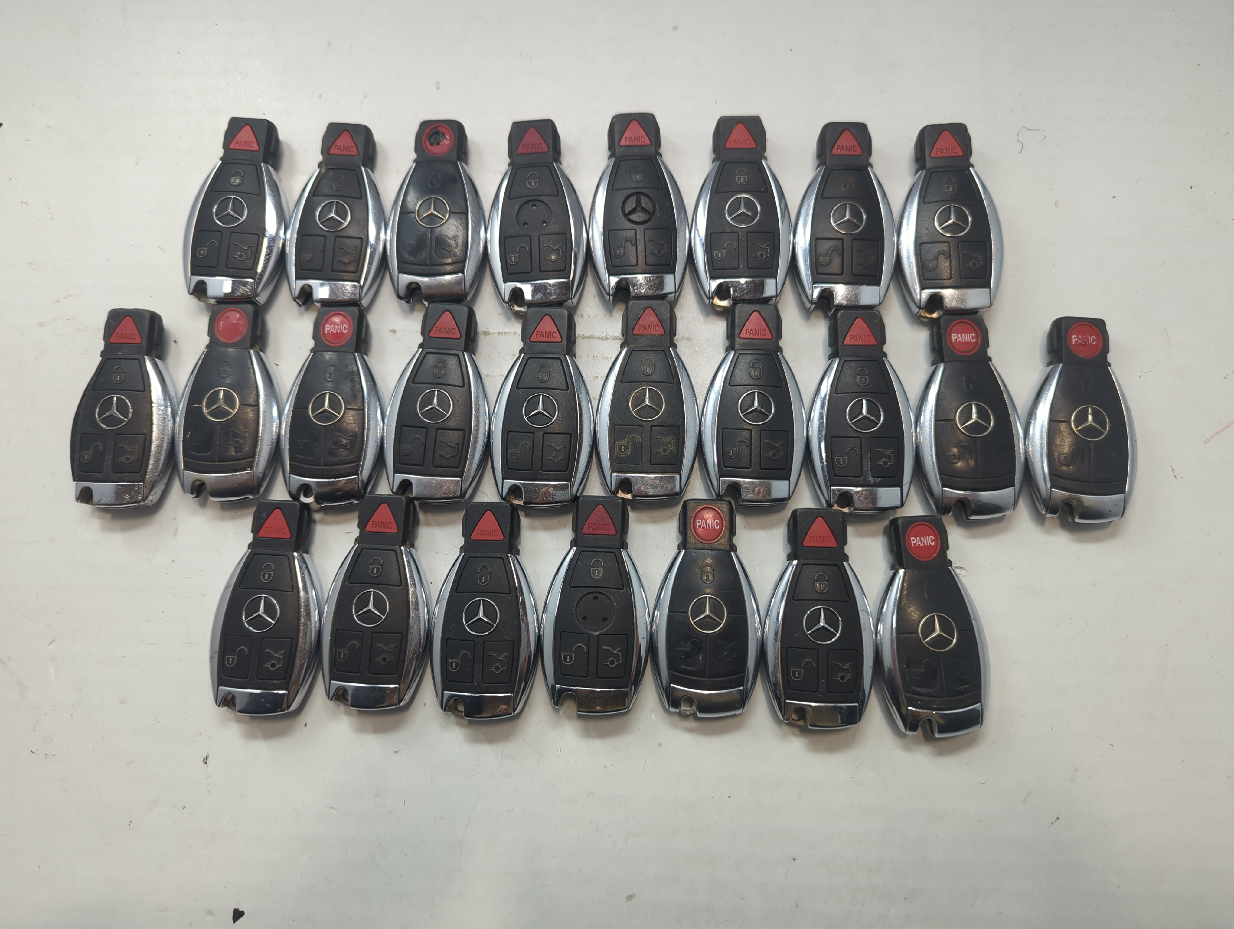 Lot of 25 Mercedes-Benz Keyless Entry Remote Fob MIXED FCC IDS MIXED 759086 - Oemusedautoparts1.com