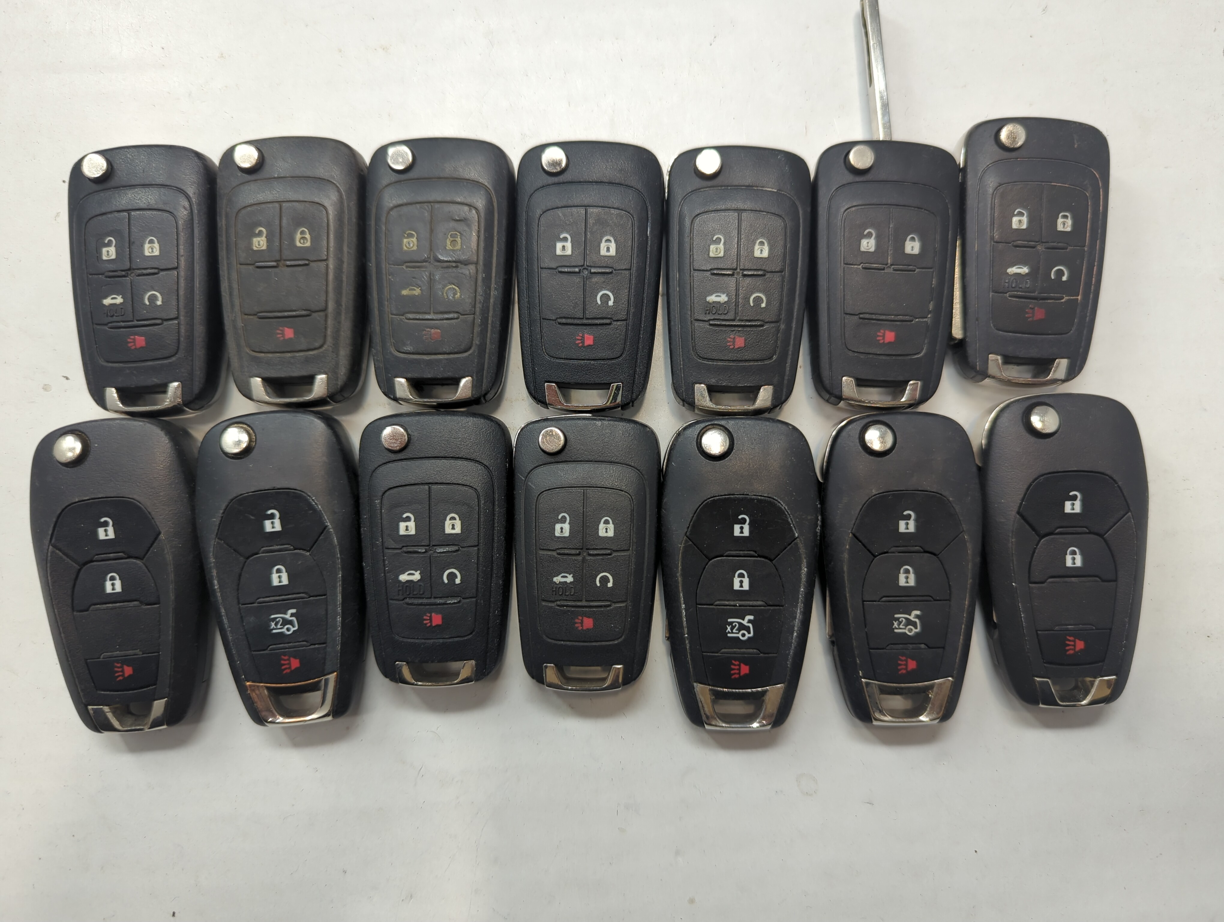 Lot of 14 Chevrolet Keyless Entry Remote Fob MIXED FCC IDS MIXED PART 759271 - Oemusedautoparts1.com