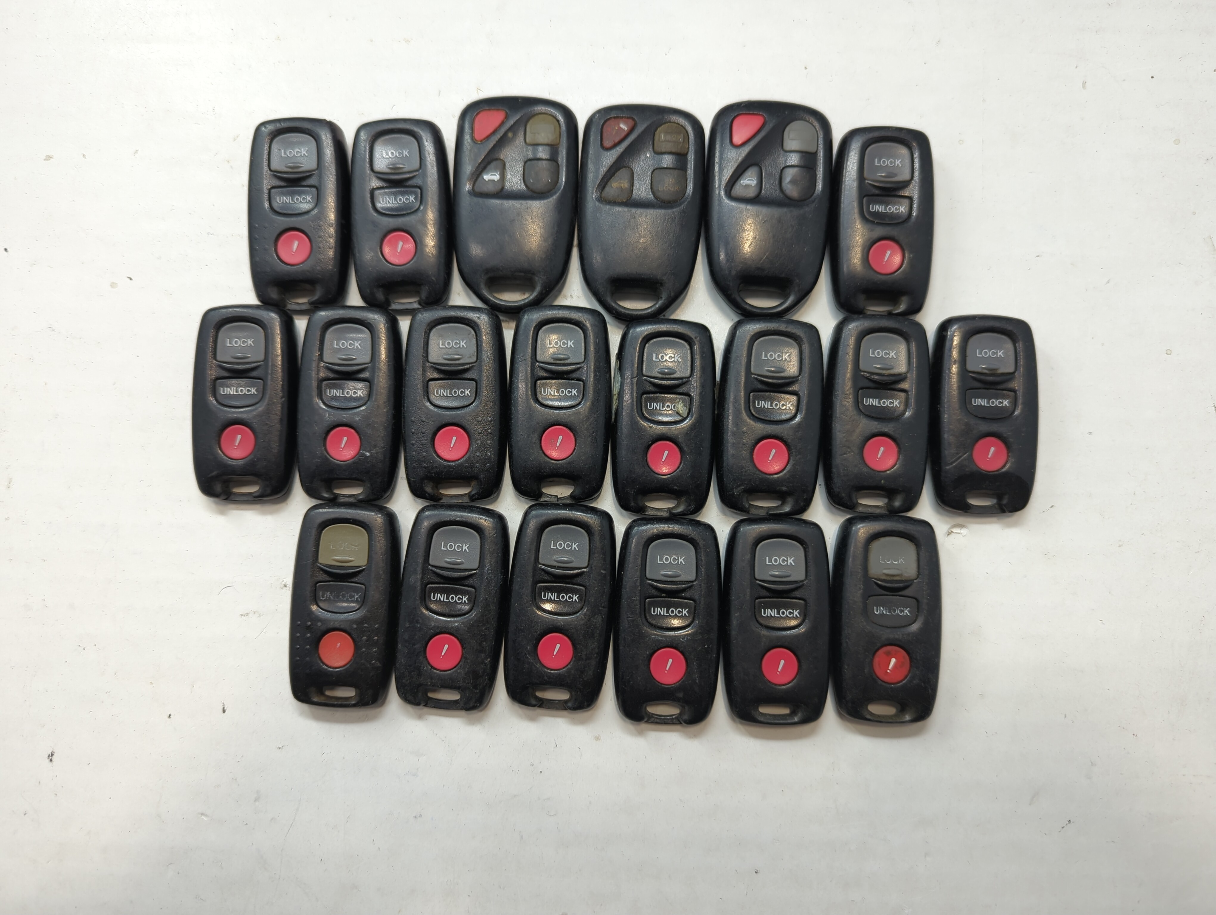 Lot of 20 Mazda Keyless Entry Remote Fob MIXED FCC IDS MIXED PART NUMBERS 776586 - Oemusedautoparts1.com