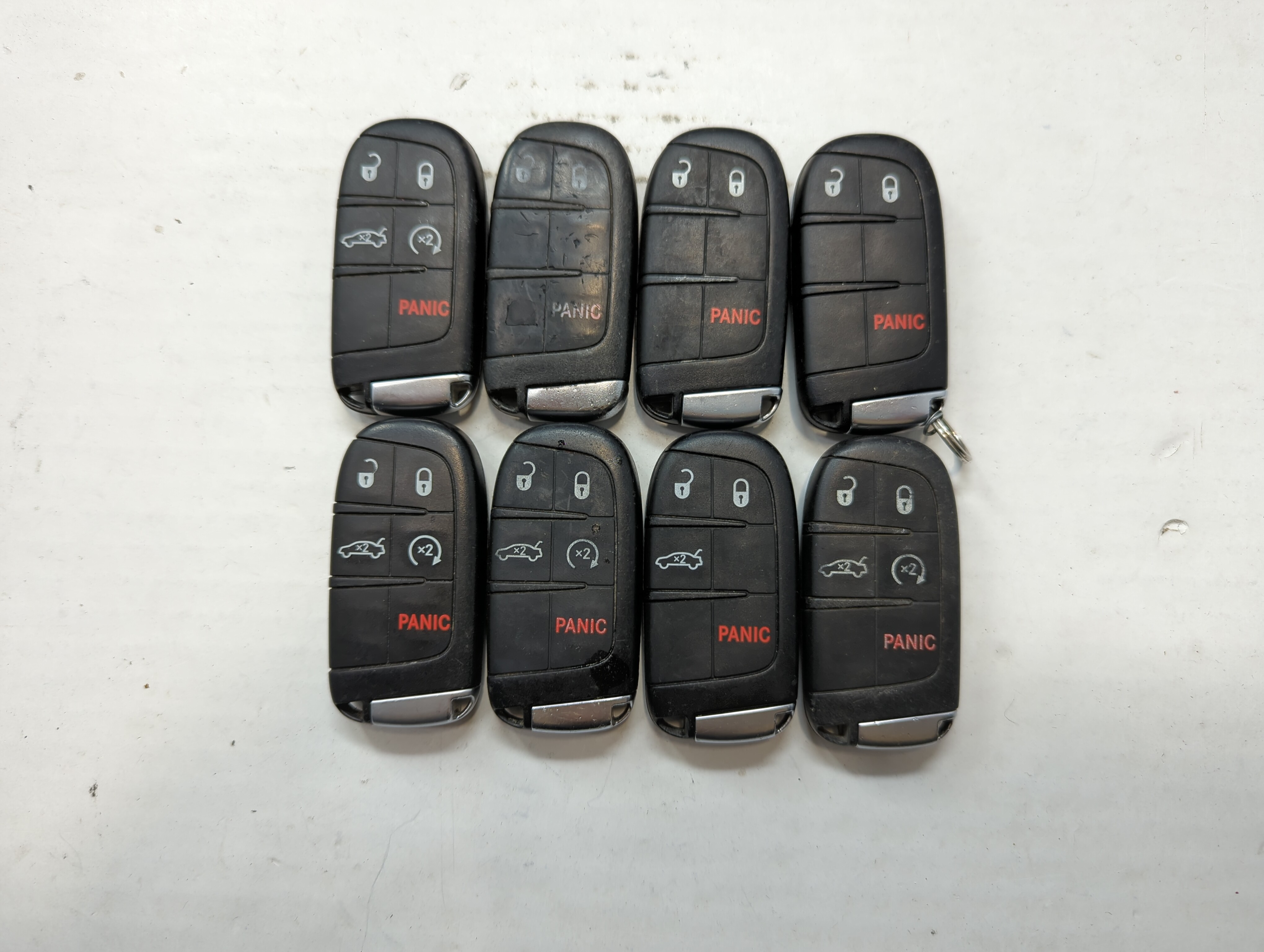 Lot of 8 Dodge Keyless Entry Remote Fob MIXED FCC IDS MIXED PART NUMBERS 776714 - Oemusedautoparts1.com