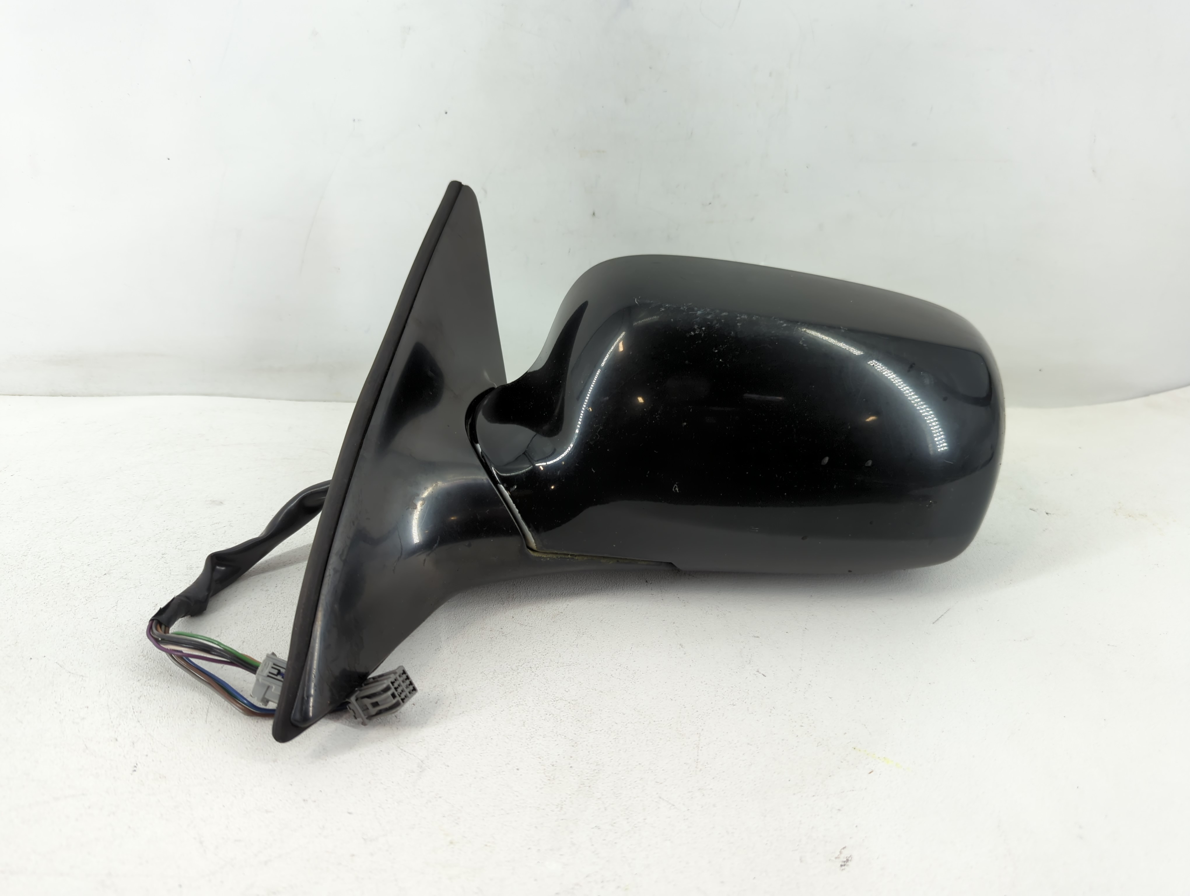 2006-2008 Buick Lucerne Driver Left Side View Manual Door Mirror Black 777320 - Oemusedautoparts1.com