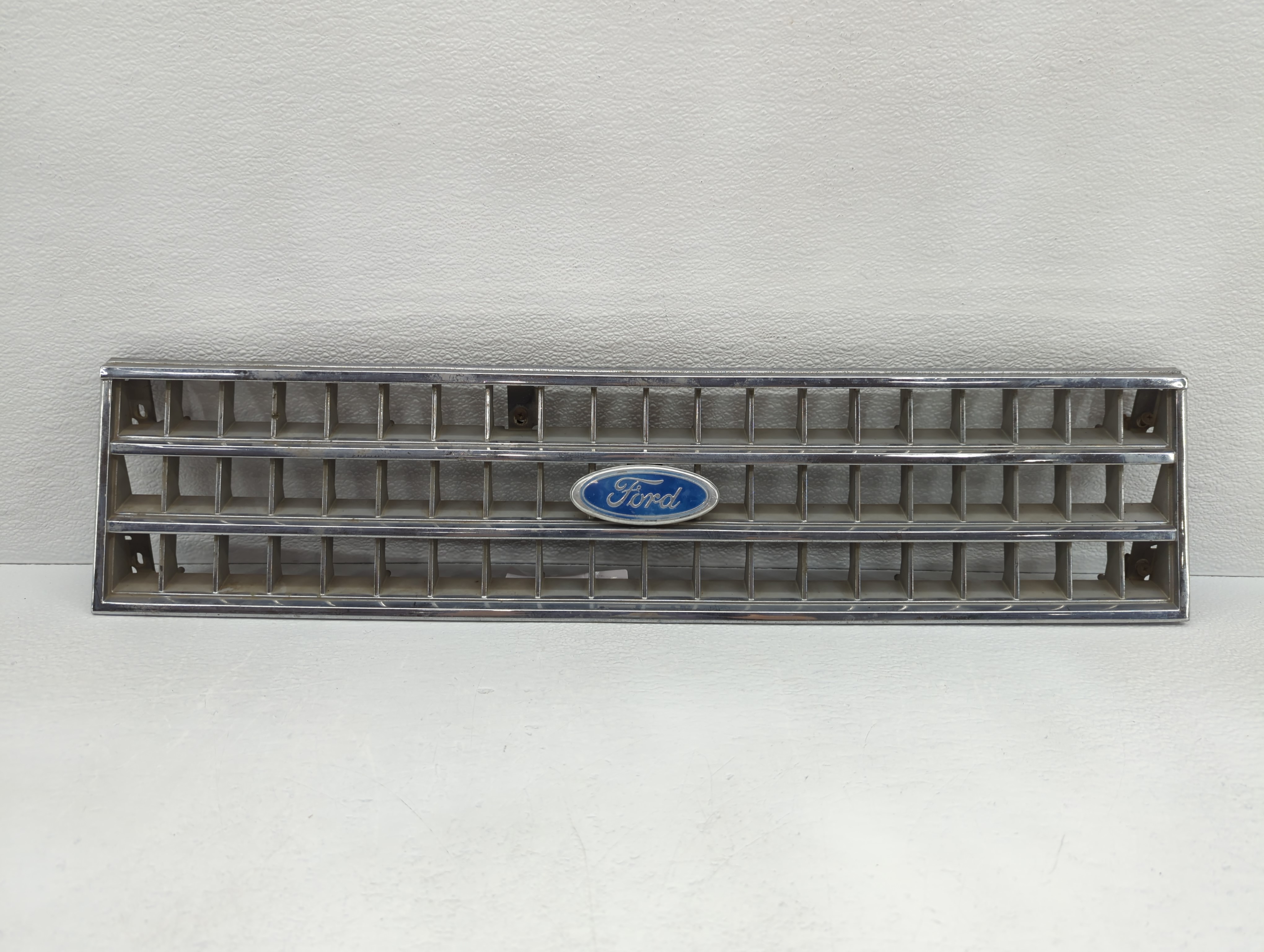 Picture of 1984 Ford Escort Front Bumper Grille Cover 781129