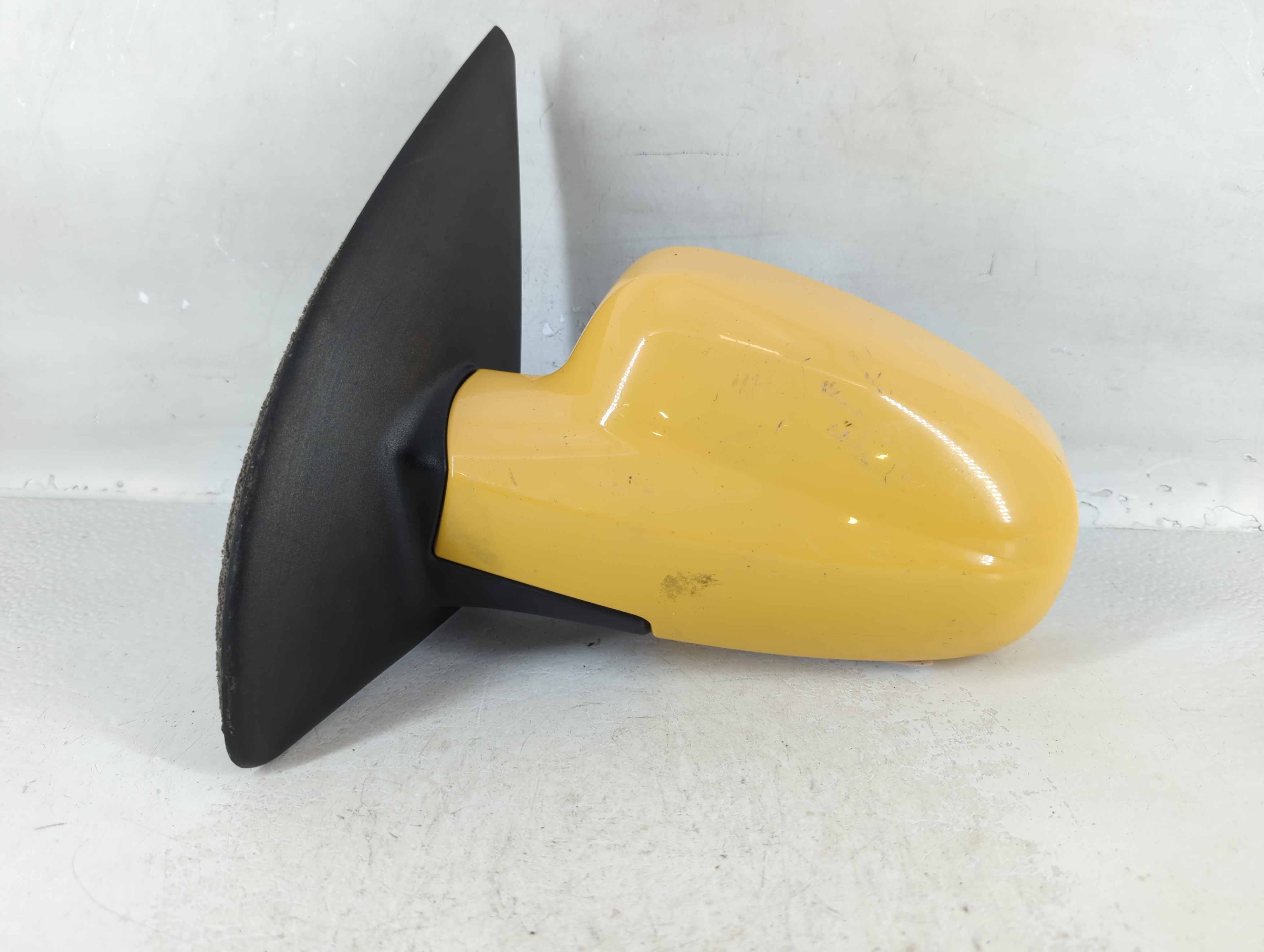 2005-2006 Chevrolet Aveo Driver Left Side View Power Door Mirror Yellow 798760 - Oemusedautoparts1.com
