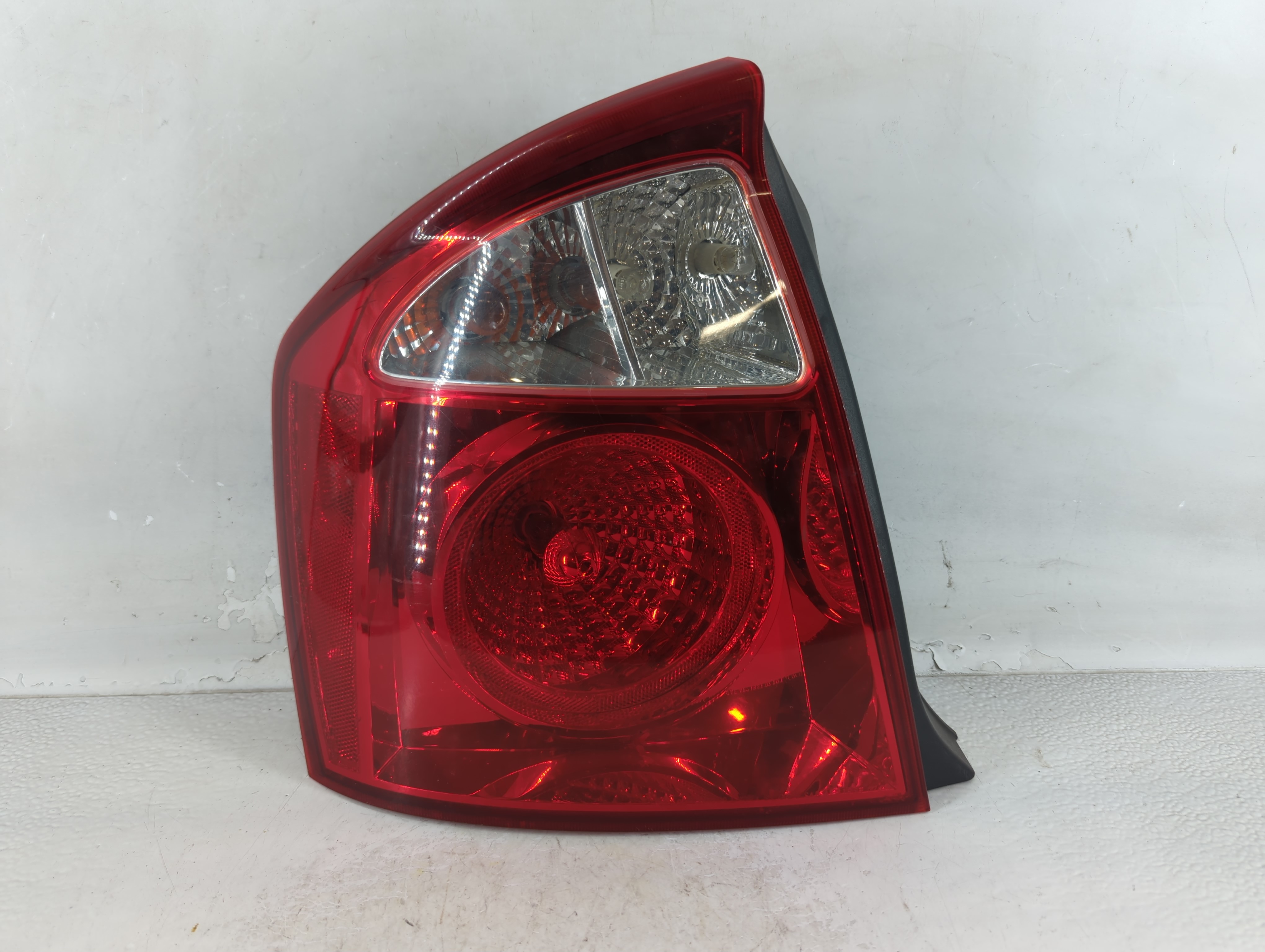 Picture of 2004-2006 Kia Spectra Driver Left Side Tail Light Taillight Oem 834508