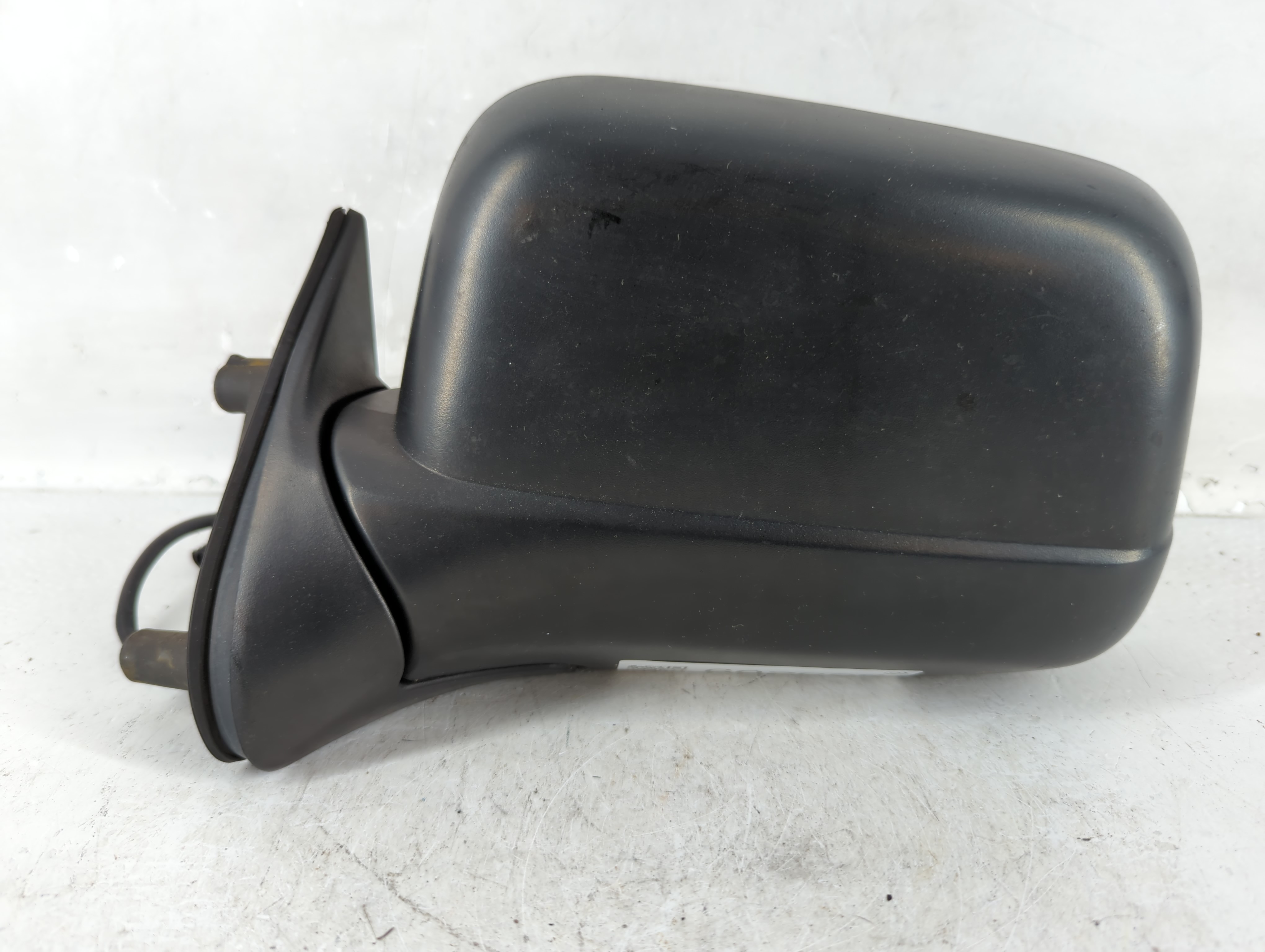 2000-2004 Nissan Frontier Driver Left Side View Manual Door Mirror Black 835209 - Oemusedautoparts1.com