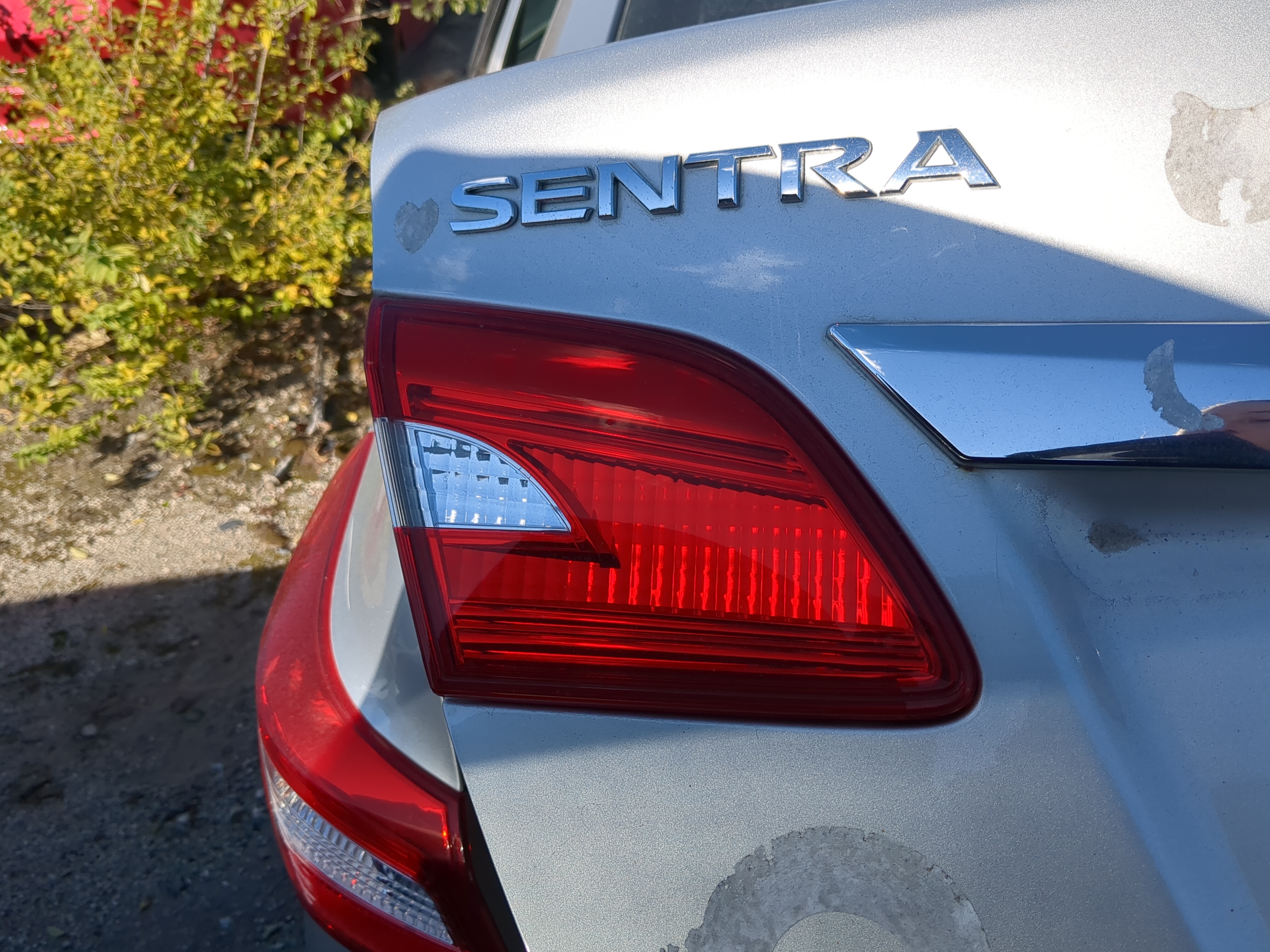 Picture of 2016 Nissan Sentra Driver Left Side Tail Light Taillight Deck Lid Mounted 893555