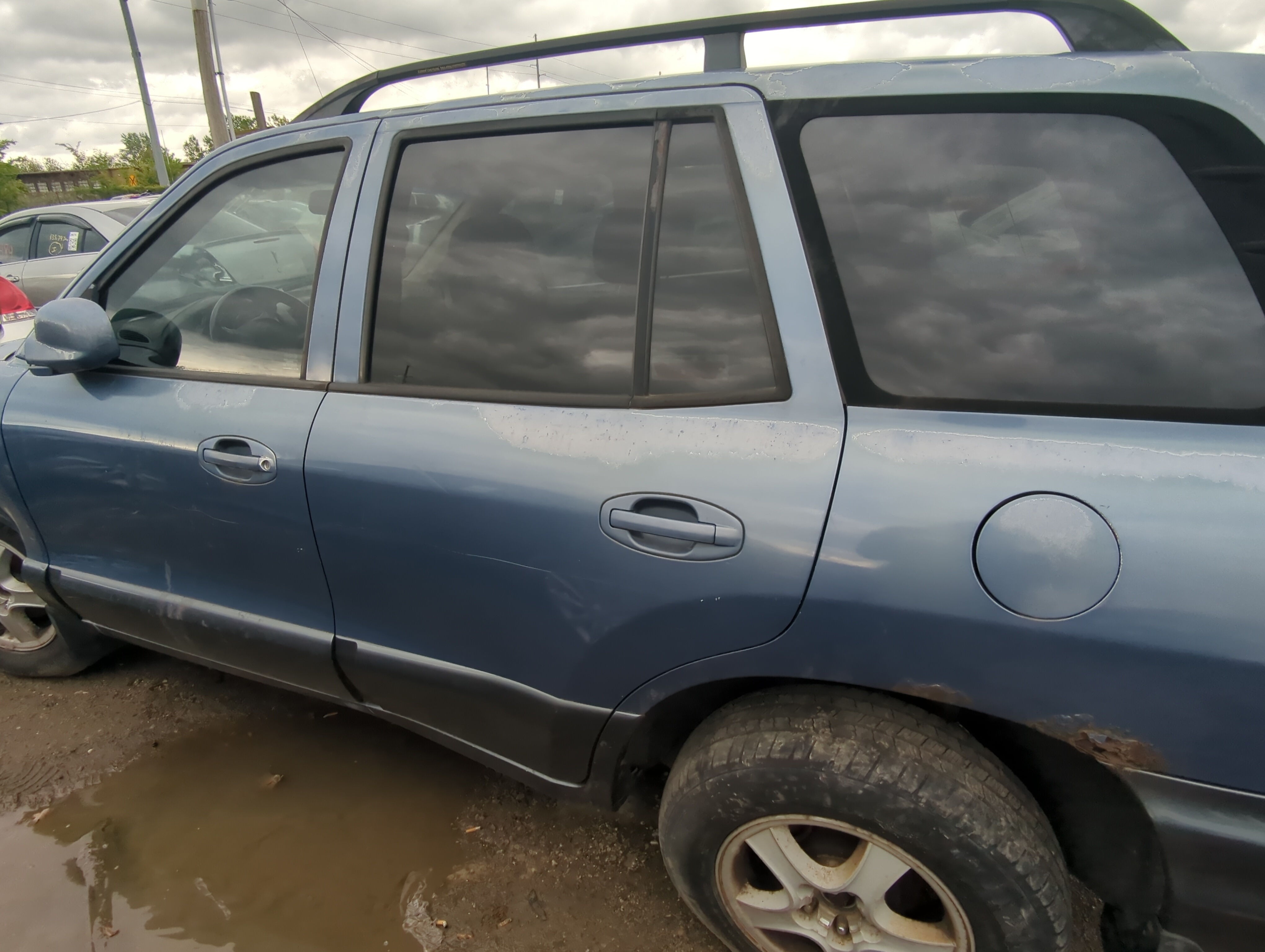 Picture of 2001-2006 Hyundai Santa Fe Driver Rear Door Oem 922326