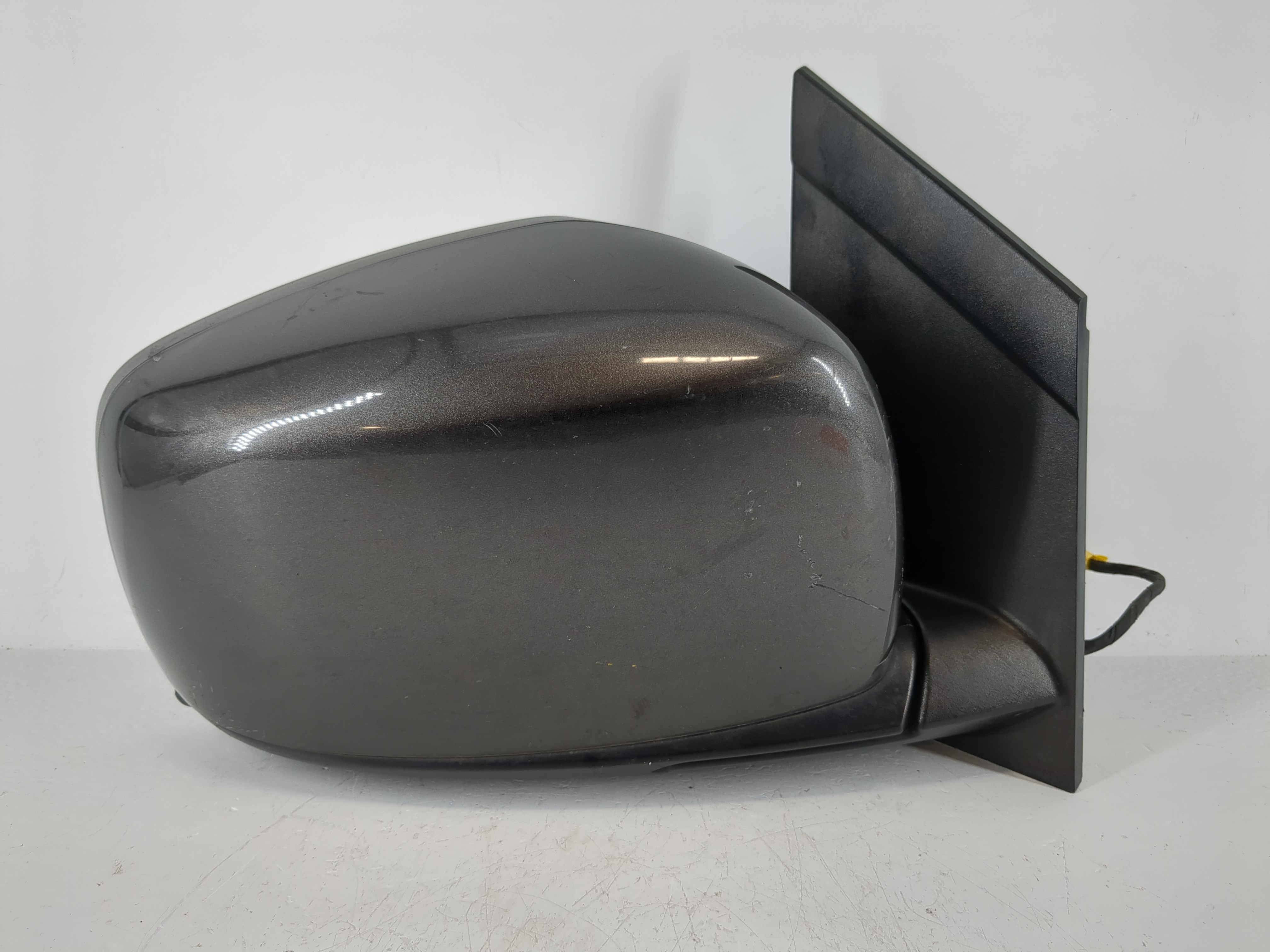 Dodge Caravan Passenger Right Side View Manual Door Mirror Dark Gray 982433 - Oemusedautoparts1.com